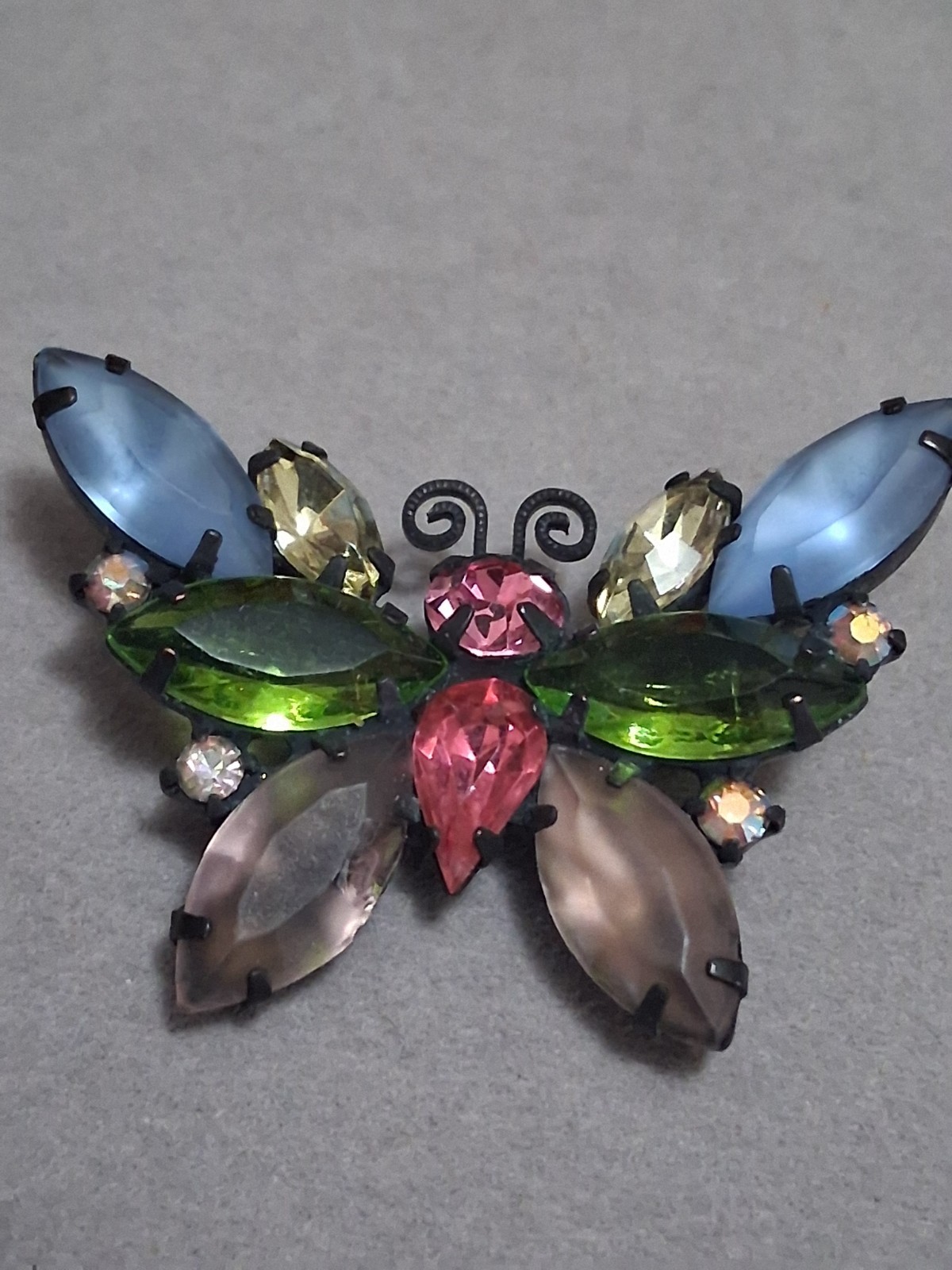 Vintage Juliana butterfly brooch multi color & shape prong set stones