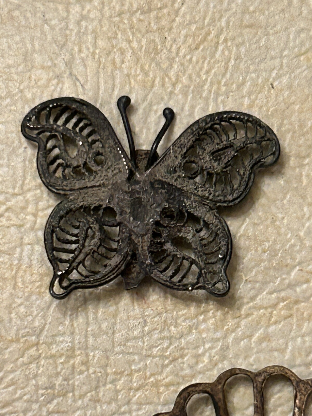 Vintage random filigree metal butterfly’s and sea shell unknown use?