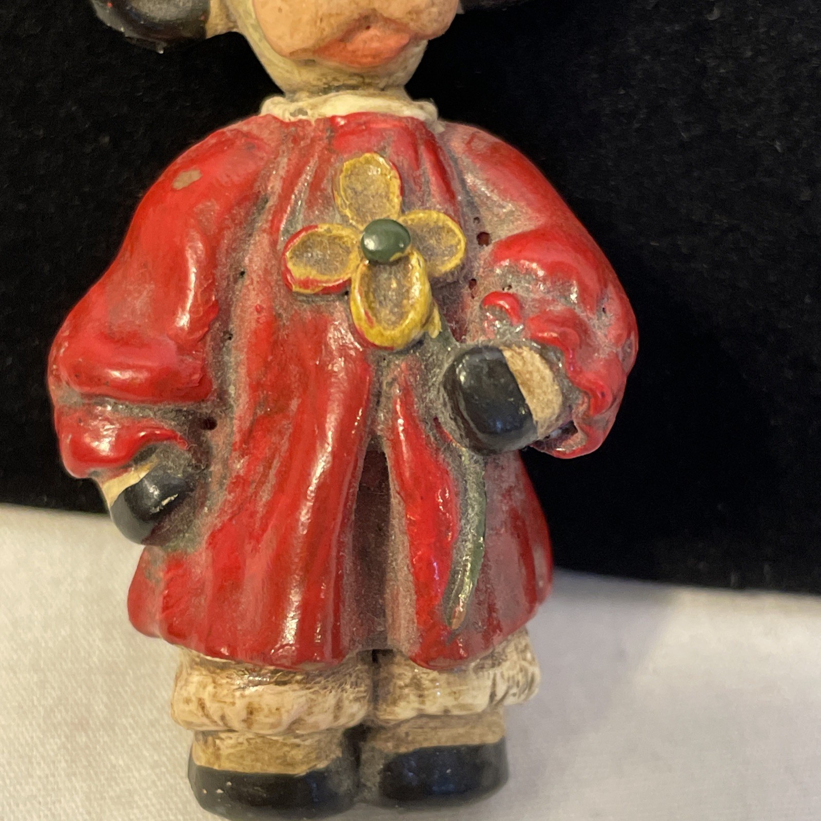 Decorative Pin Painted Ceramic Cow In Red Robe Holding Yellow Flower 2.25 in