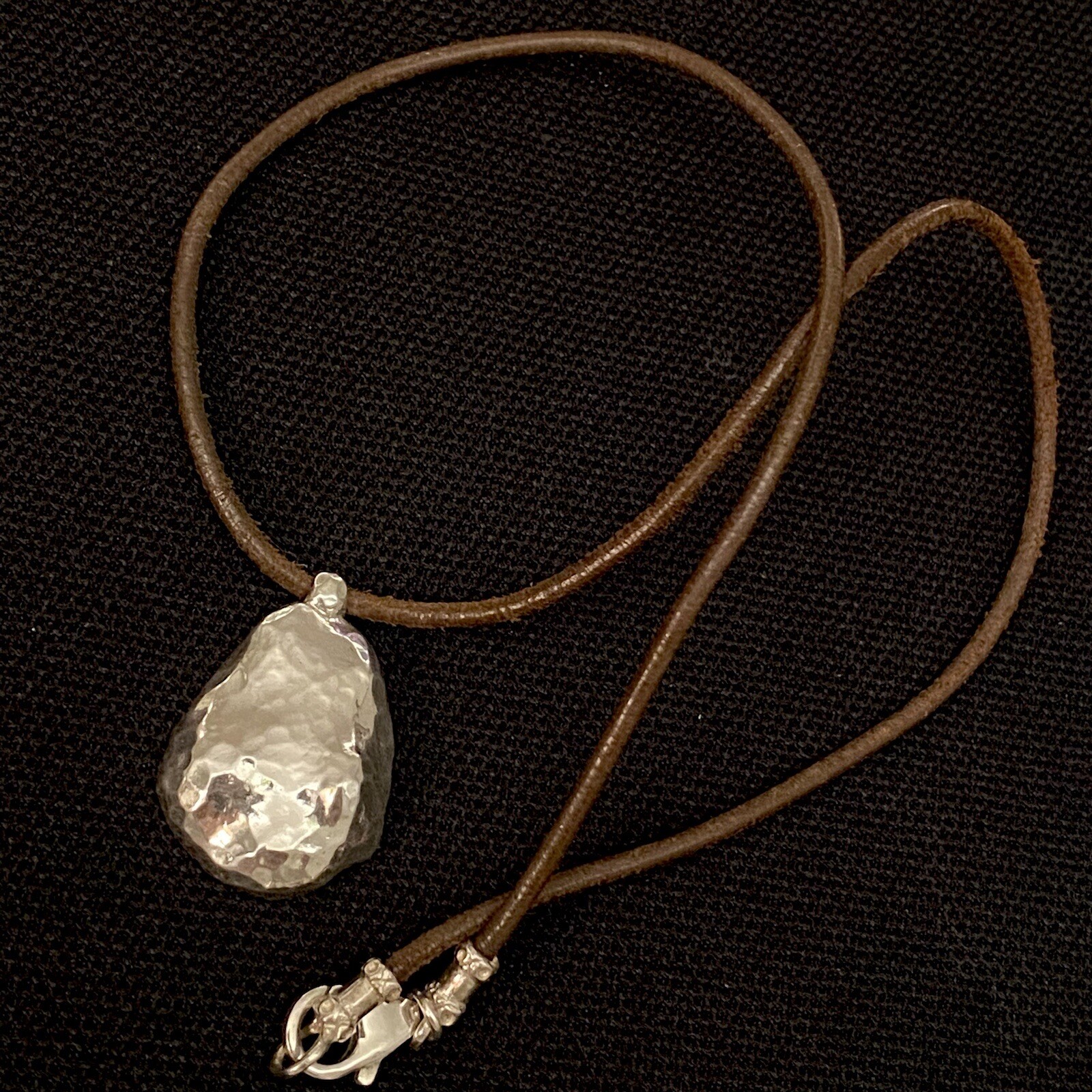 NICE ESTATE STERLING SILVER NUGGET STYLE PENDANT ON LEATHER CORD NECKLACE 16”