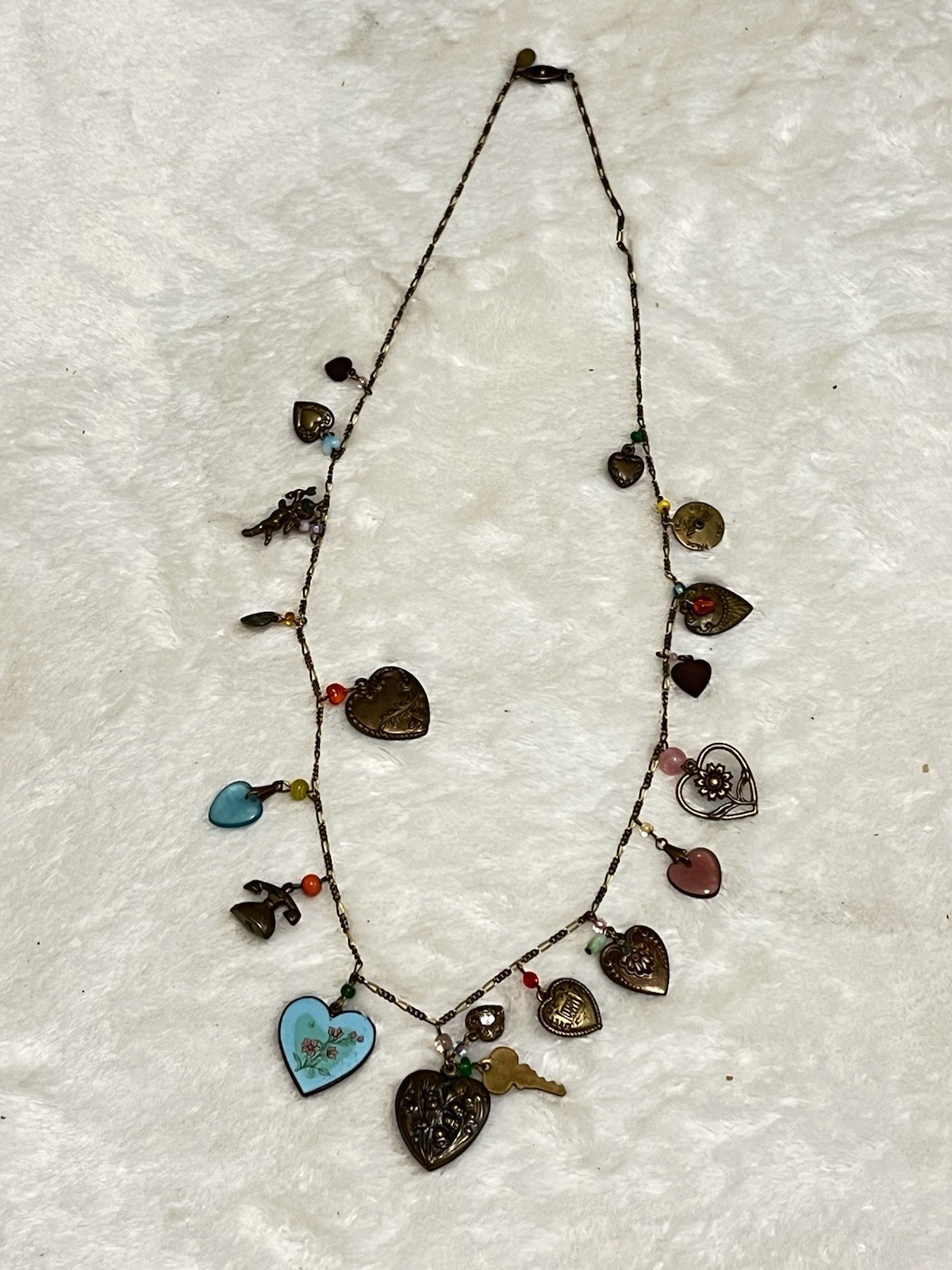 VTG GLASS WORKS STUDIO 19 Charms 29″ Long Bronze Necklace Hearts Lie Detector