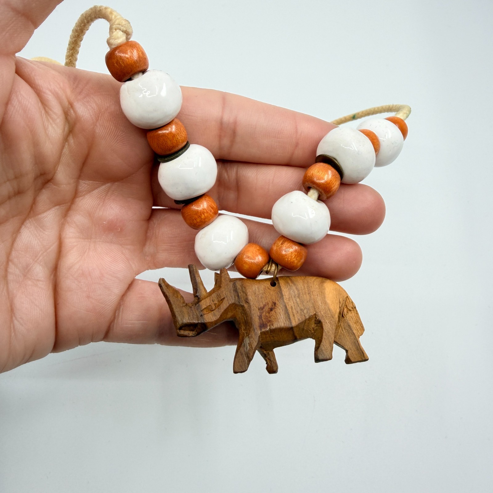 Vintage Carved Wood Rhinoceros Pendant Necklace Boho Ceramic Bead Cord 80s