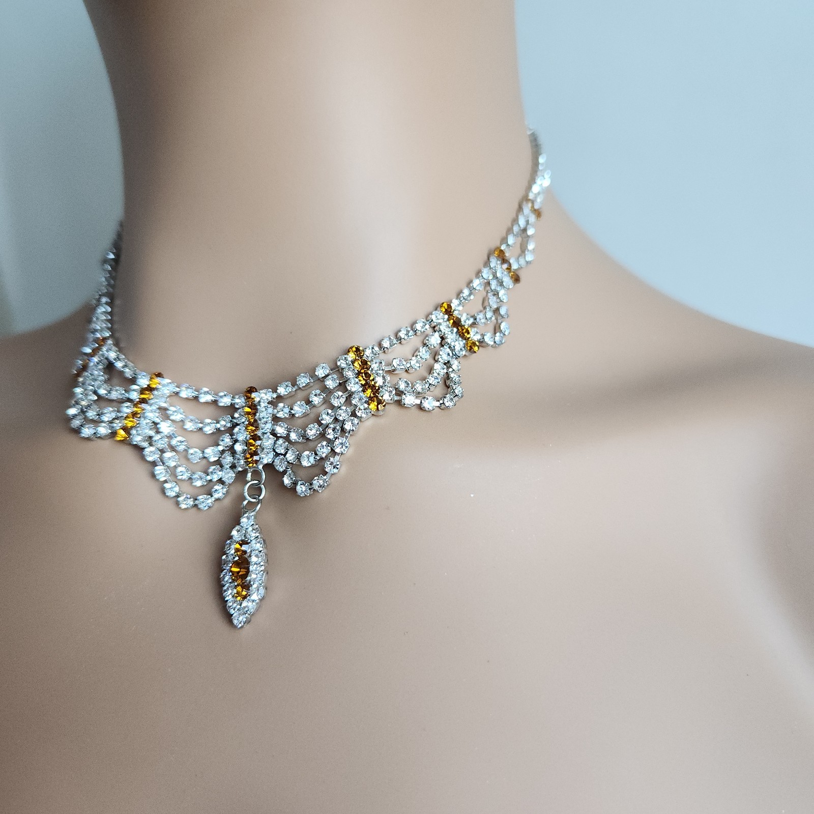 Old Hollywood Rhinestone Necklace Amber Accent Draped Bib 15–17” Silver