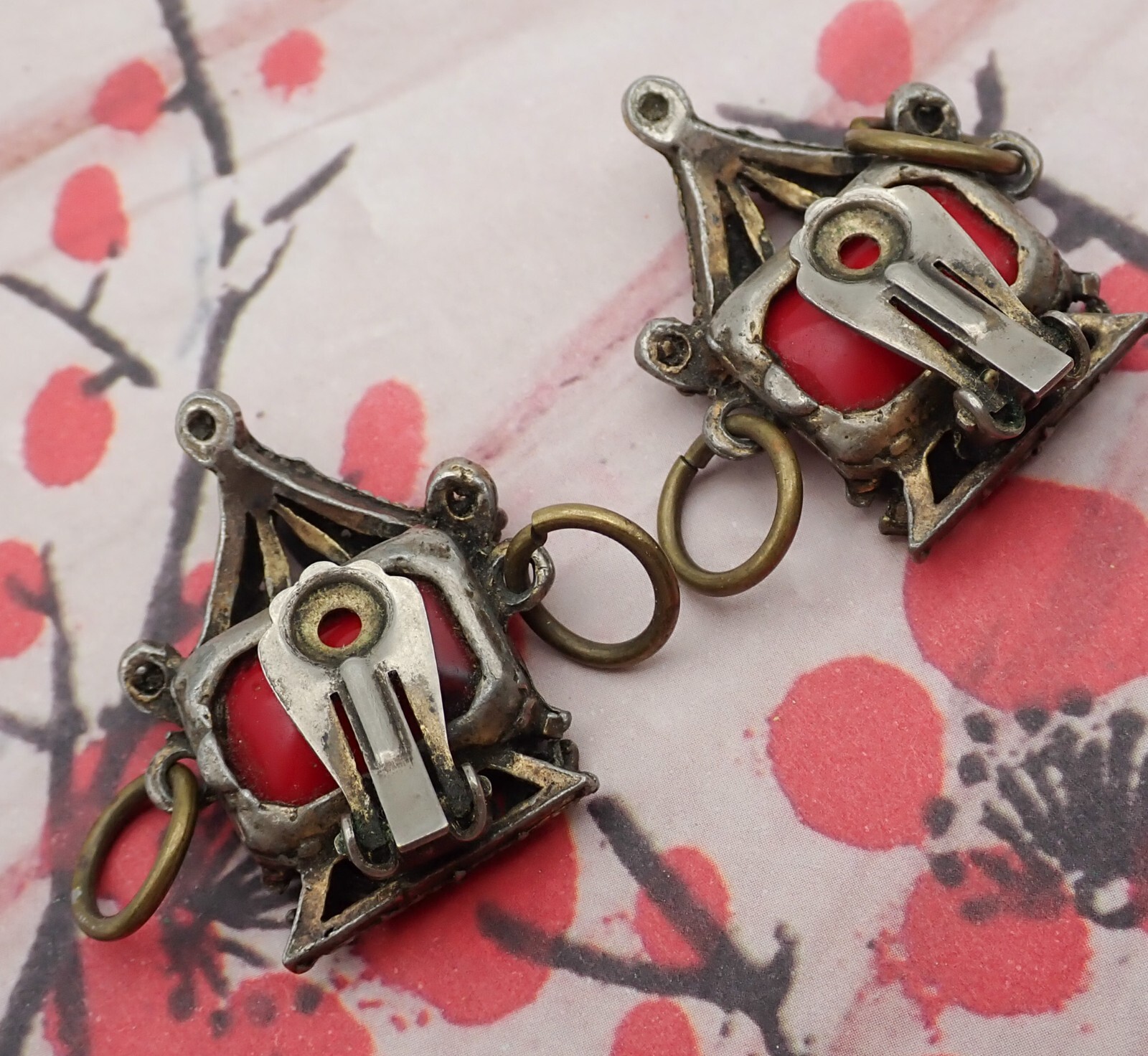 Vintage Fu Manchu Red Art Glass Caged Bronze Tone Clip Earrings