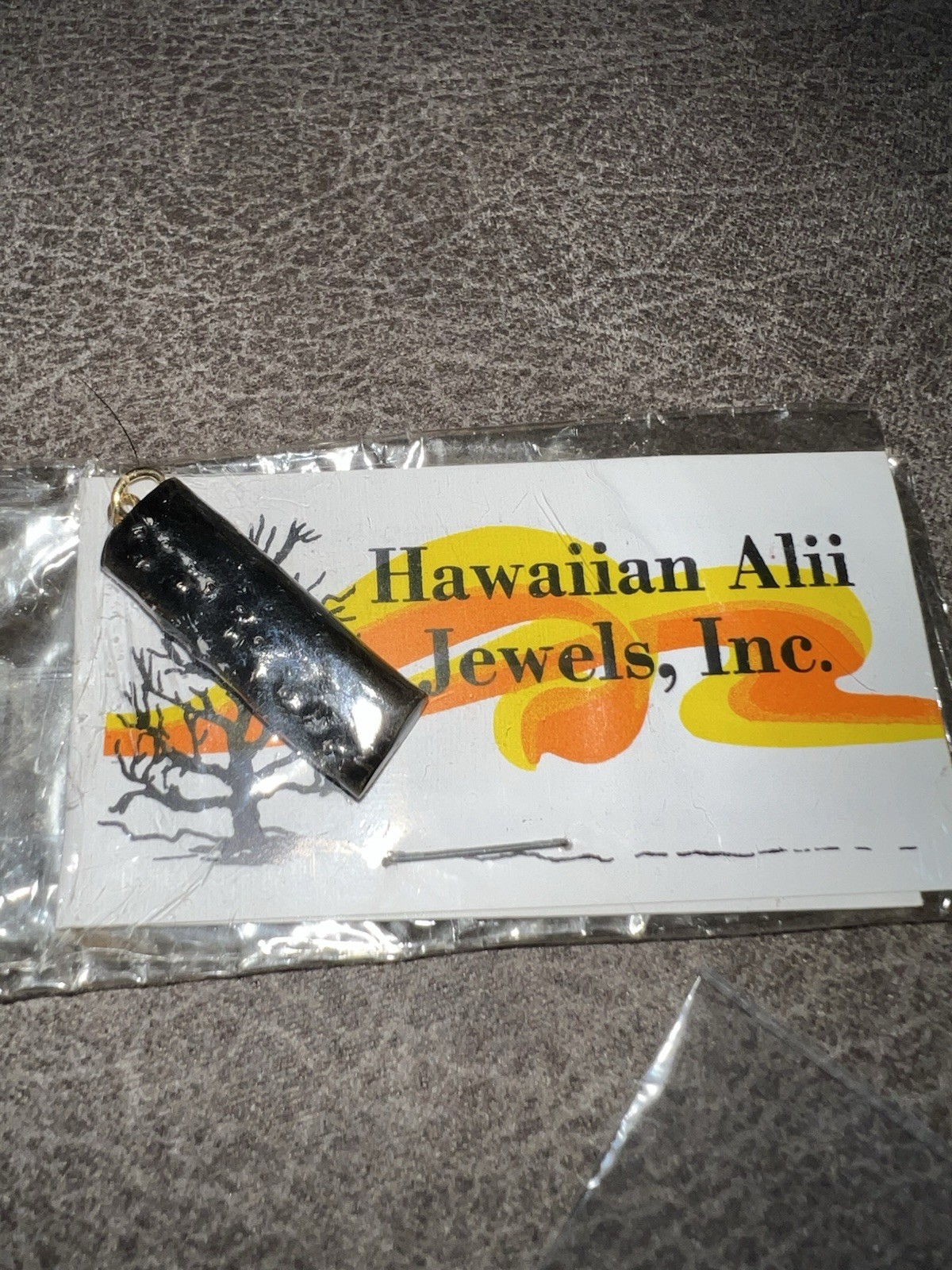 Vintage Hawaiian black coral pendant (in original package)