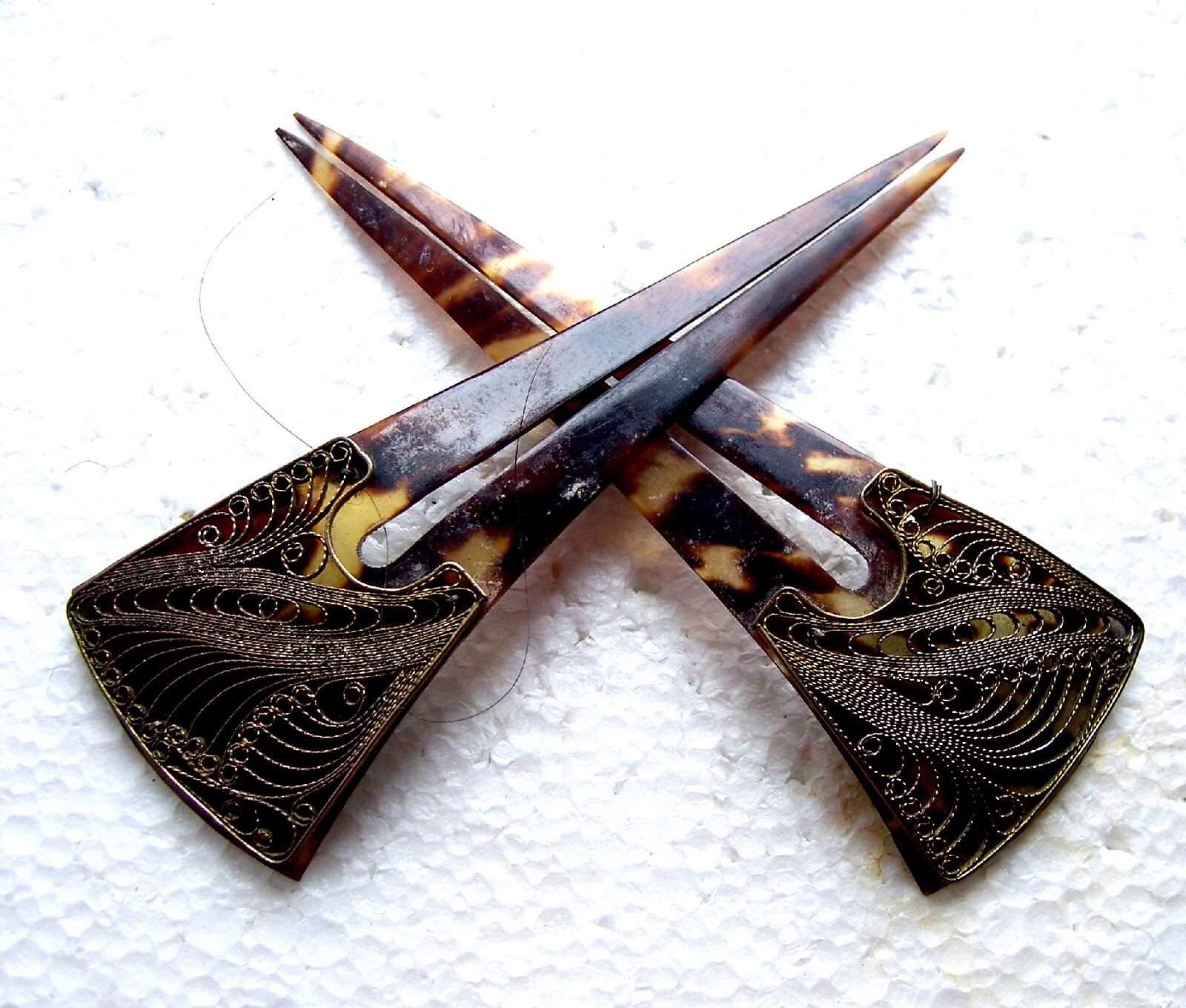 Two faux tortoiseshell hair combs with filigree decoration (AAG)