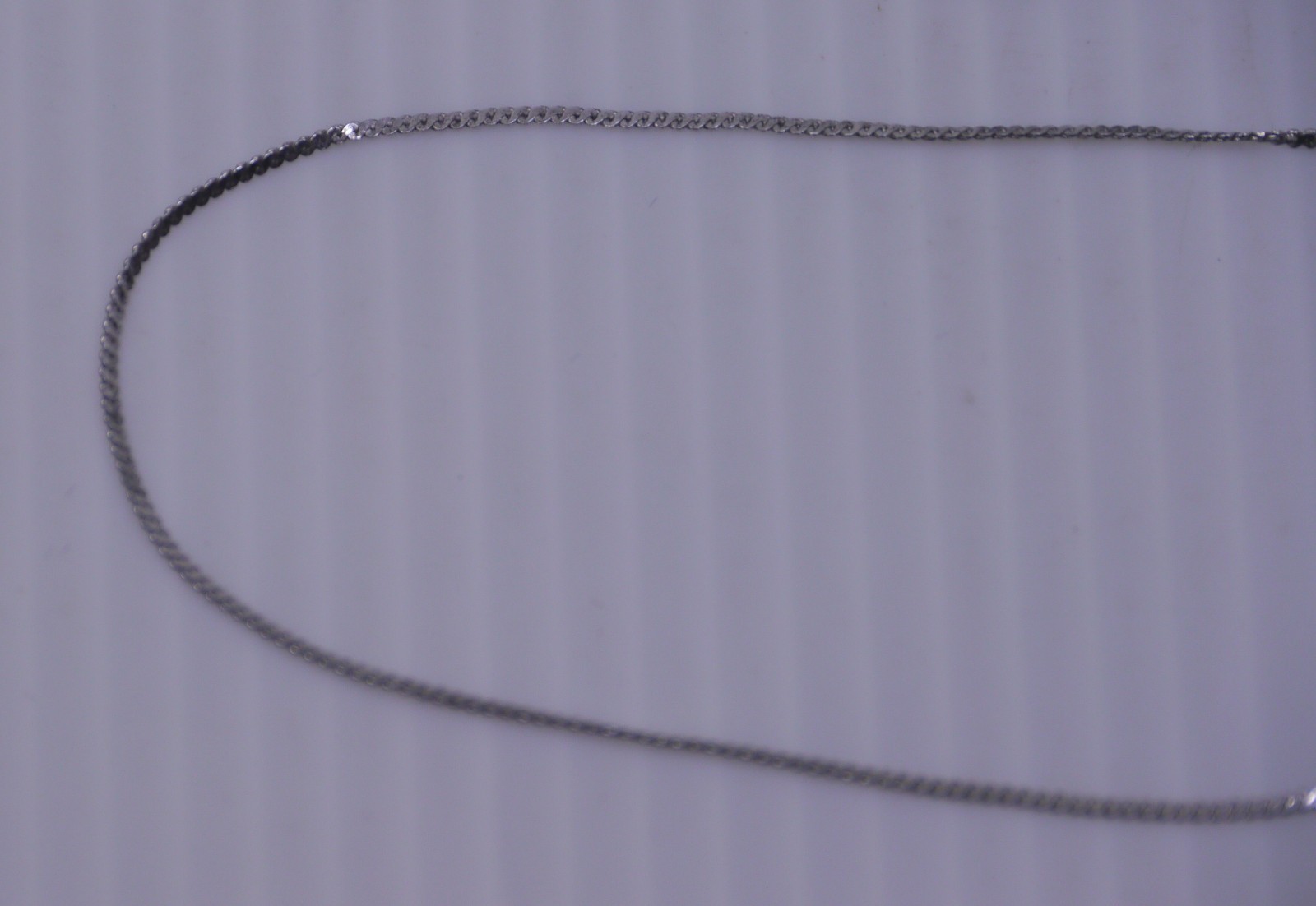 L – VINTAGE AVON SIGNED STERLING SILVER THIN SERPENTINE CHAIN NECKLACE, 17.5 IN.