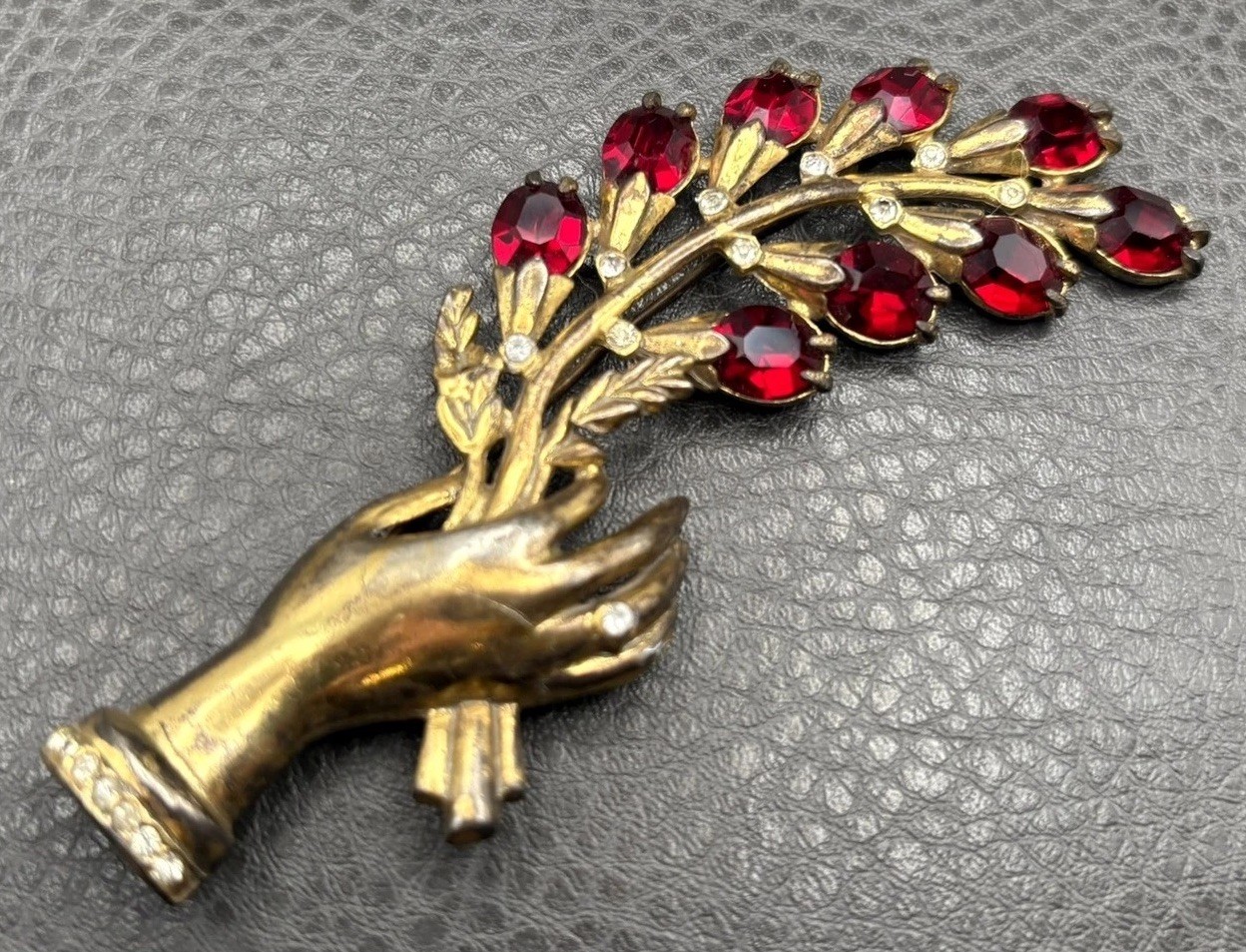 Vintage 4.25” HUGE Pot Metal Hand Holding Flowers Brooch Red Rhinestone