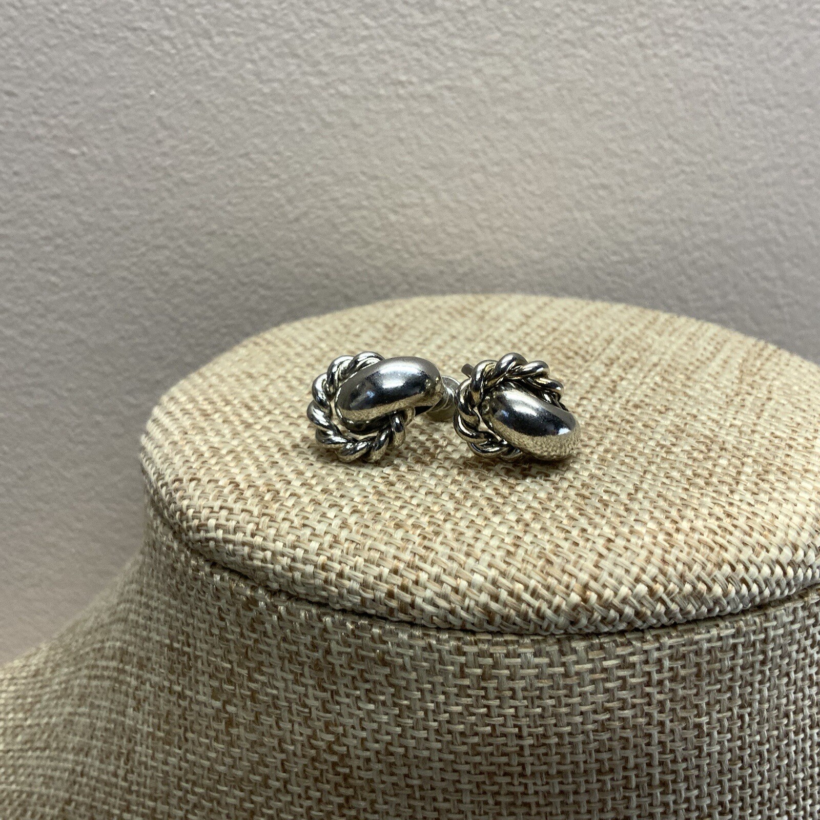 Classic vintage 60s screw back knot earrings in silver tone metal