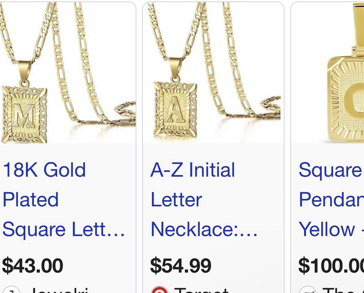 18 Gold Plated ‘M’ Pendant Necklace w/vintage-style sunburst & filigree detail.