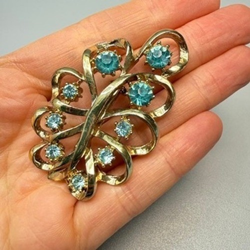 Vintage Coro Gold Tone Blue Rhinestone Brooch Leaf Ribbon Swirl