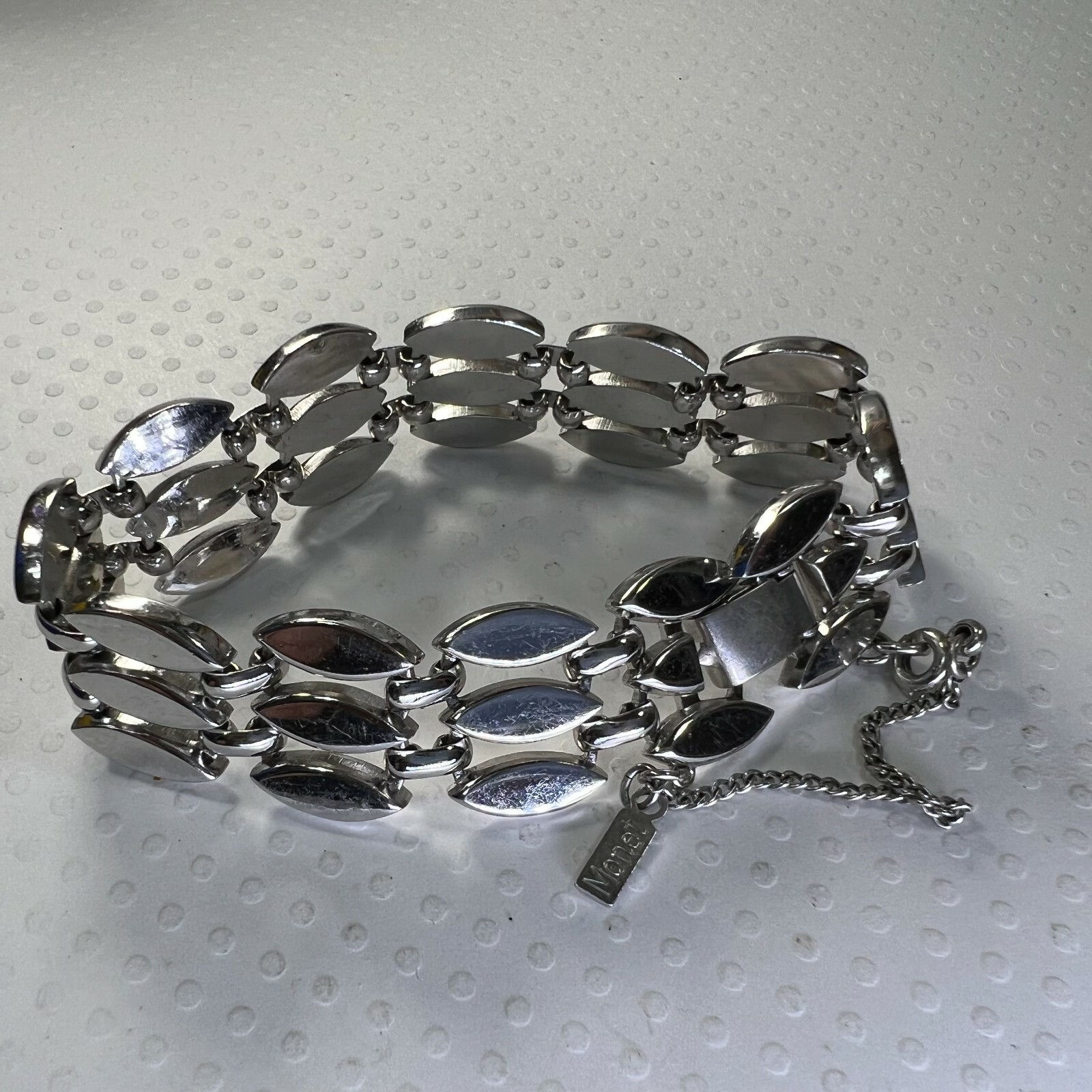 Vintage MONET 5/8″ x 7 1/4″ SILVER TONE heavy bracelet with safety chain