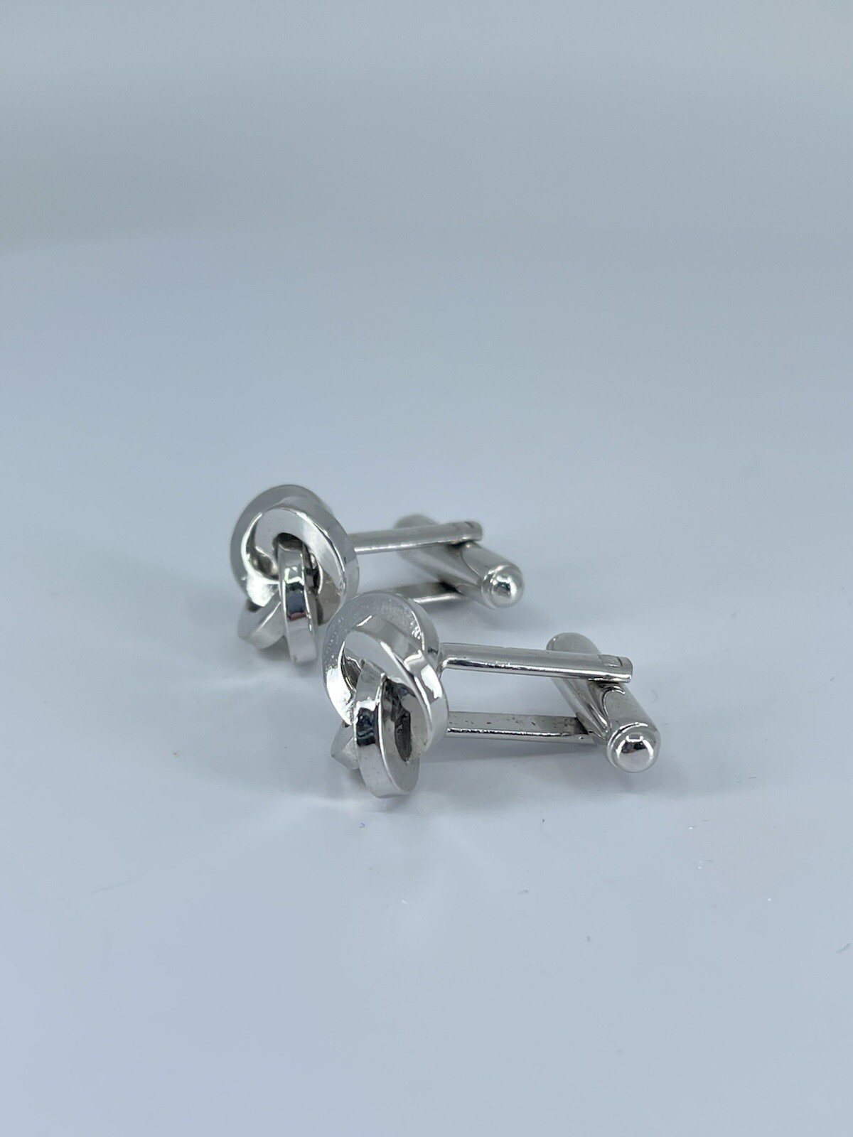 Silver tone Knot cufflinks polished metal knotted design bullet backs 7/8″