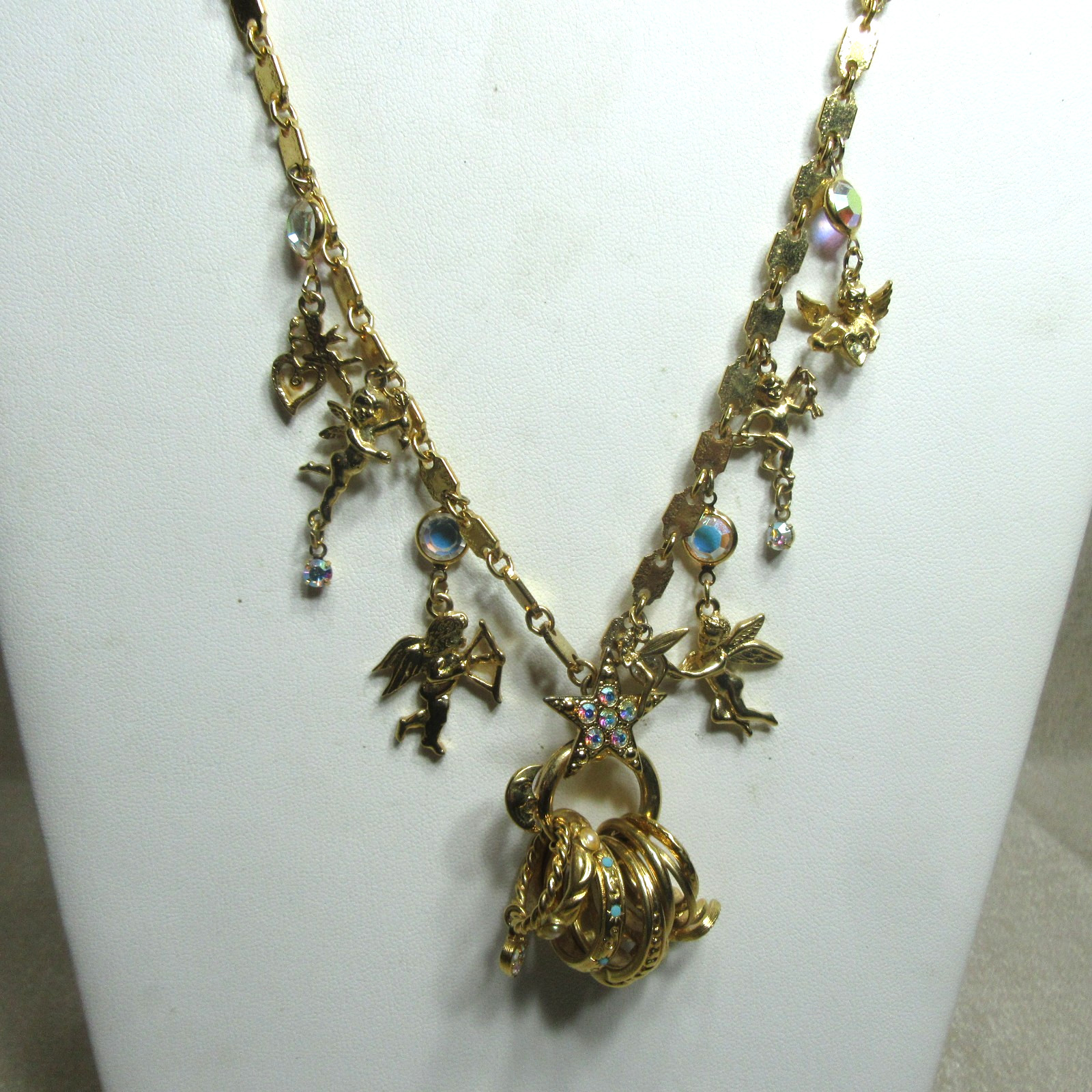 Vintage Goldtone Kirks Folly Seven Angels Charms and Ring Set
