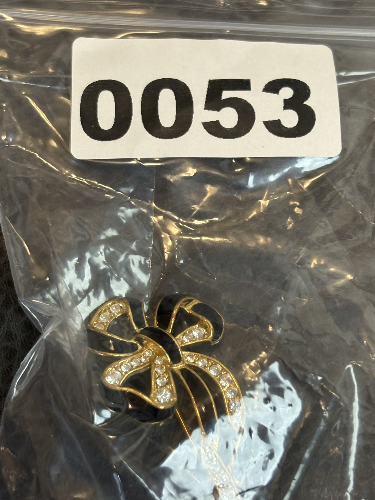 Vintage 80s Runway Gold Tone Rhinestone Black Enamel Ribbon Bow Brooch Pin