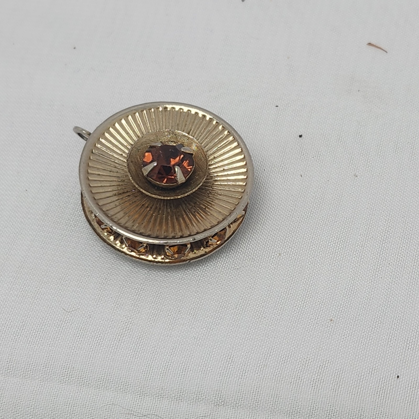 Vintage Amber Honey color faceted gemstone gold tone radial lines pendant