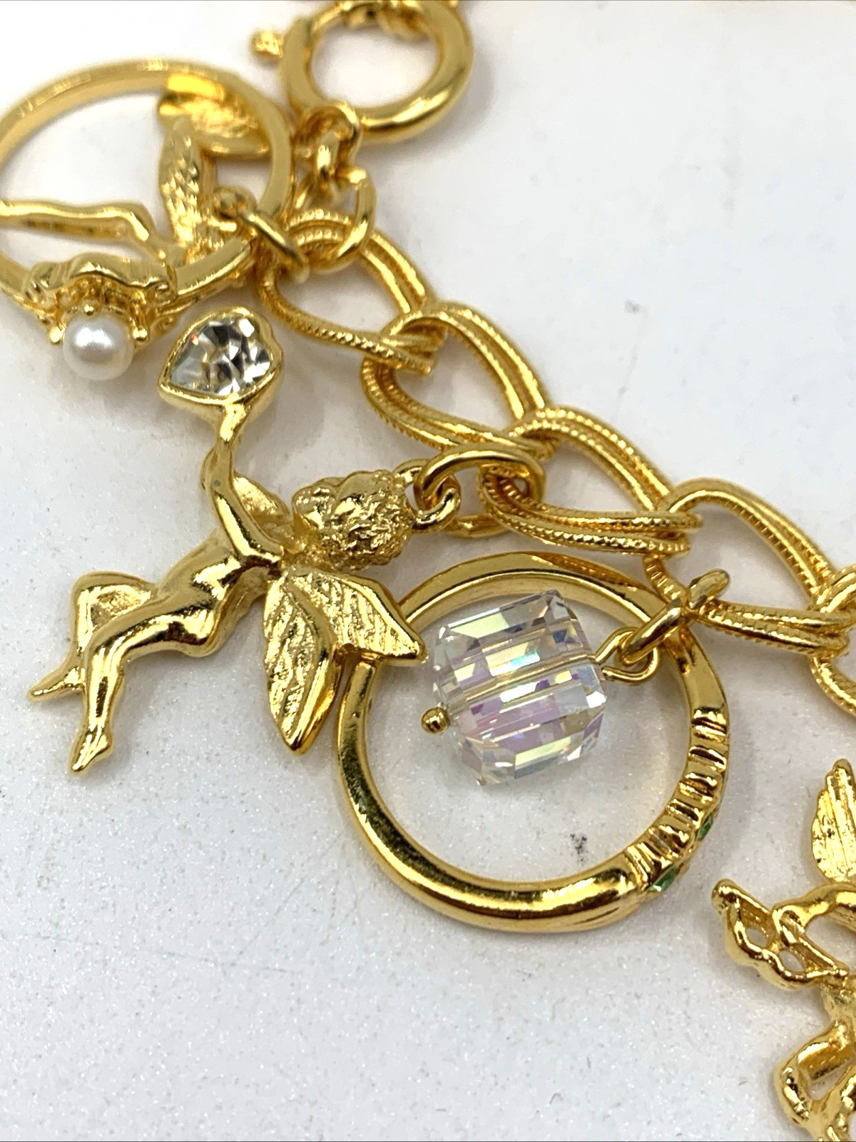 Kirks Folly Gold Tone Charm Bracelet Cupid Hearts Rings Crystals Angel