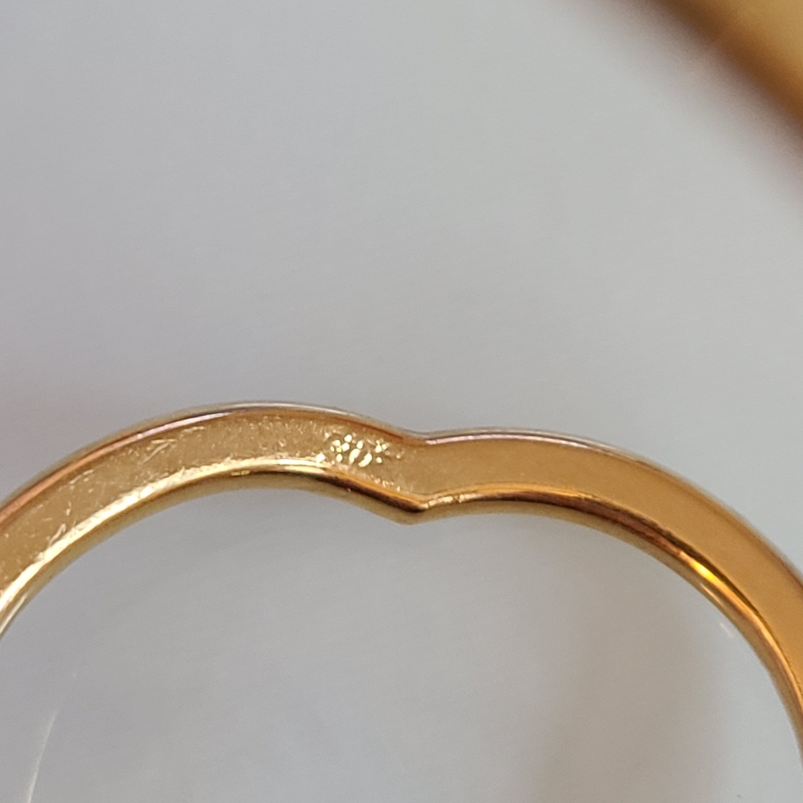 Gold-Tone Open Heart Hinged Cuff Bracelet with Multi-Color Rhinestones.