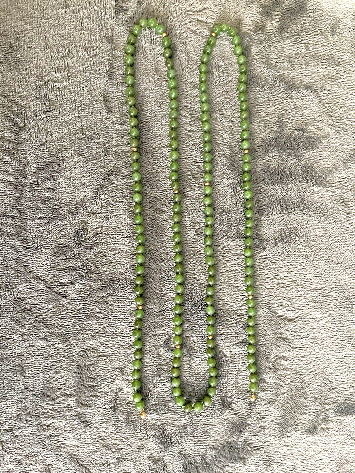 Marilynn Alsdorf Collection Spinach Jade 43″ Lavalier from Sotheby’s Auction