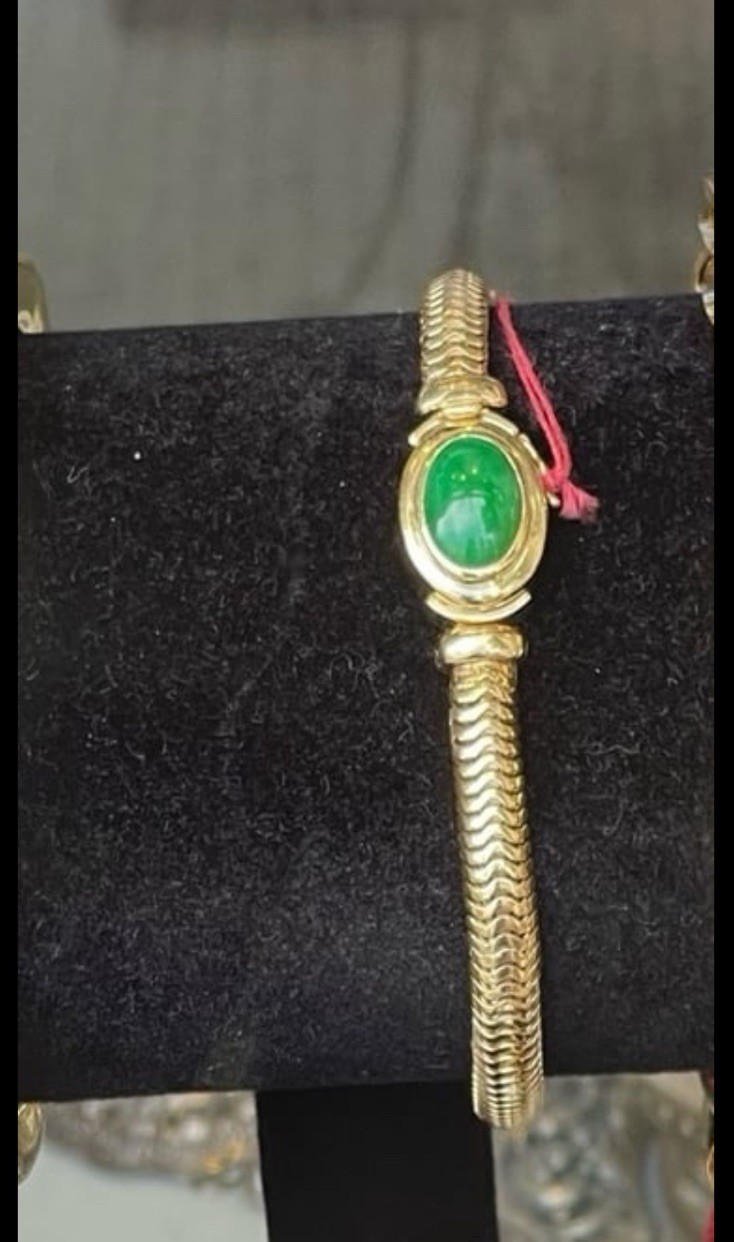 Vintage estate 14k gold snake bracelet with a vivid green jade stone