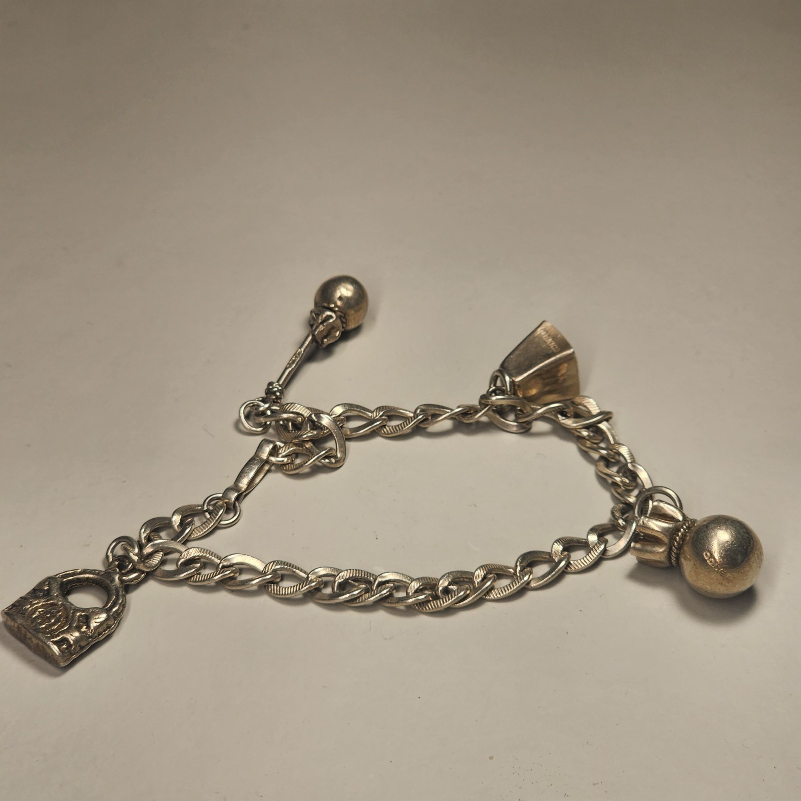 Sterling Silver Bracelet Charm Bracelet 14 Gms 7-1/2″ Long Four Silver Charms