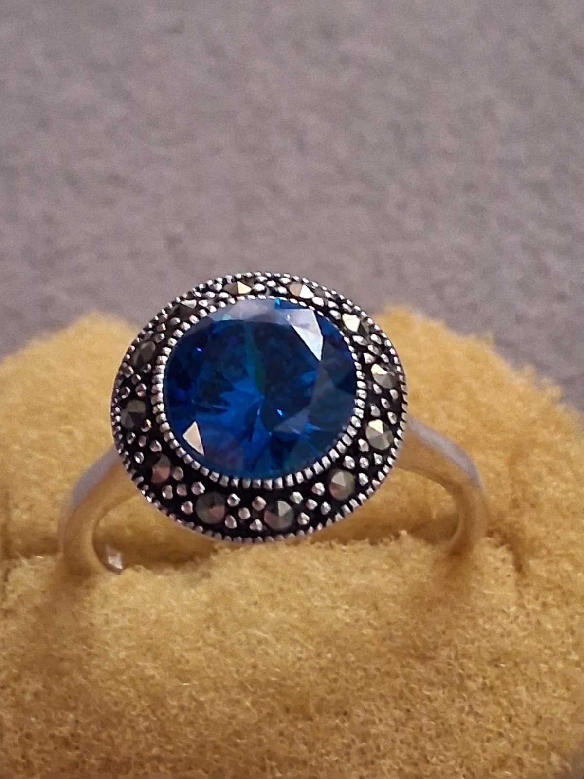 Blue faceted & marcasite halo ring, silverplated, round setting, SZ 6.75