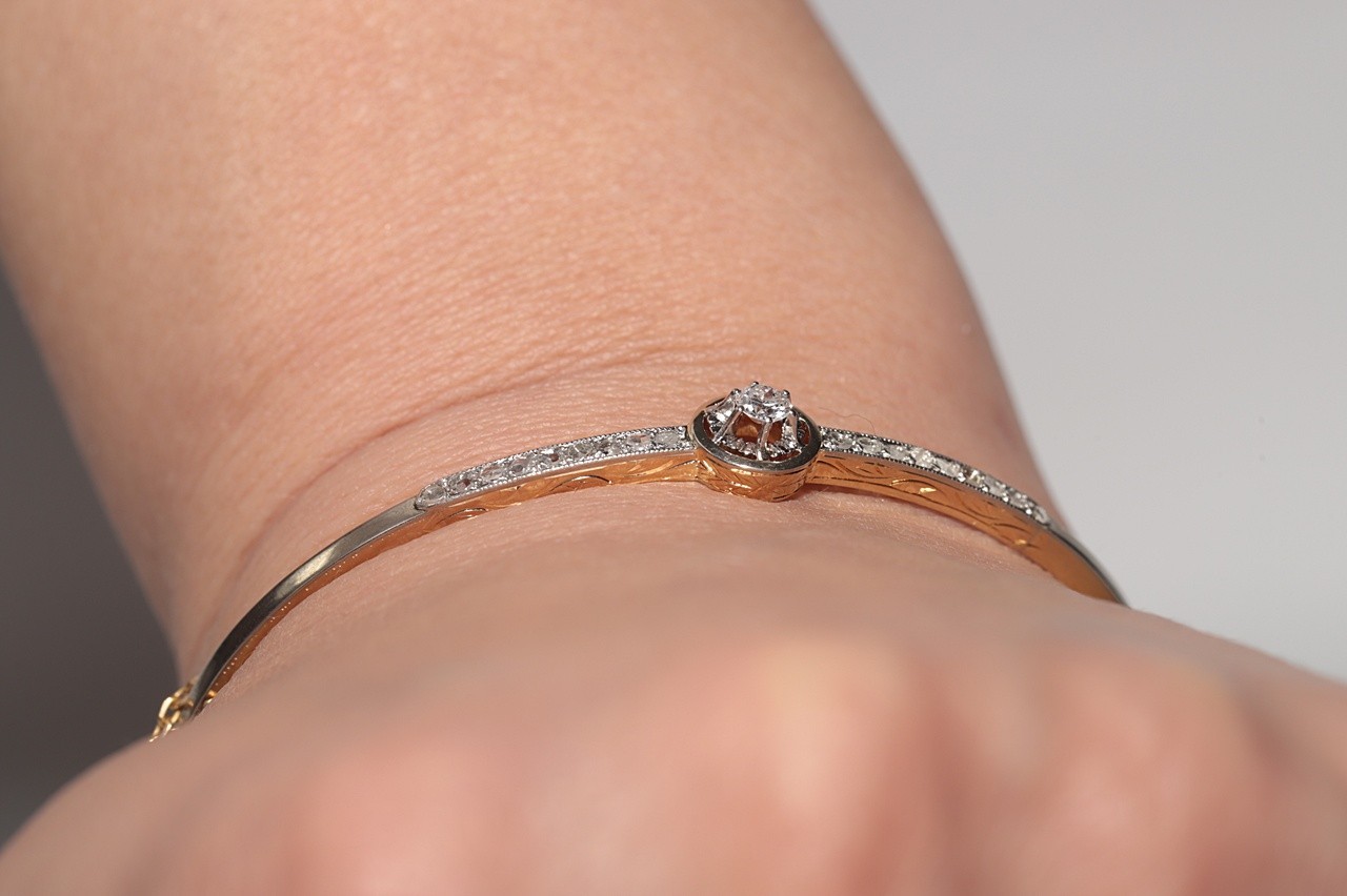 Antique Circa 1920s Art Deco 18k Gold Natural Diamond Decorated Bangle Bracelet