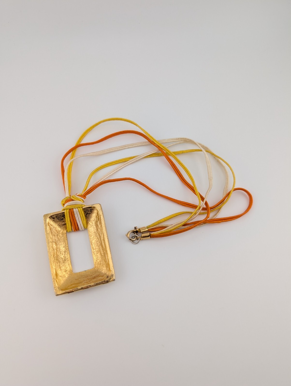 Vintage Gold Tone Fabric String Rectangle Cream Orange Enamel Pendant Necklace
