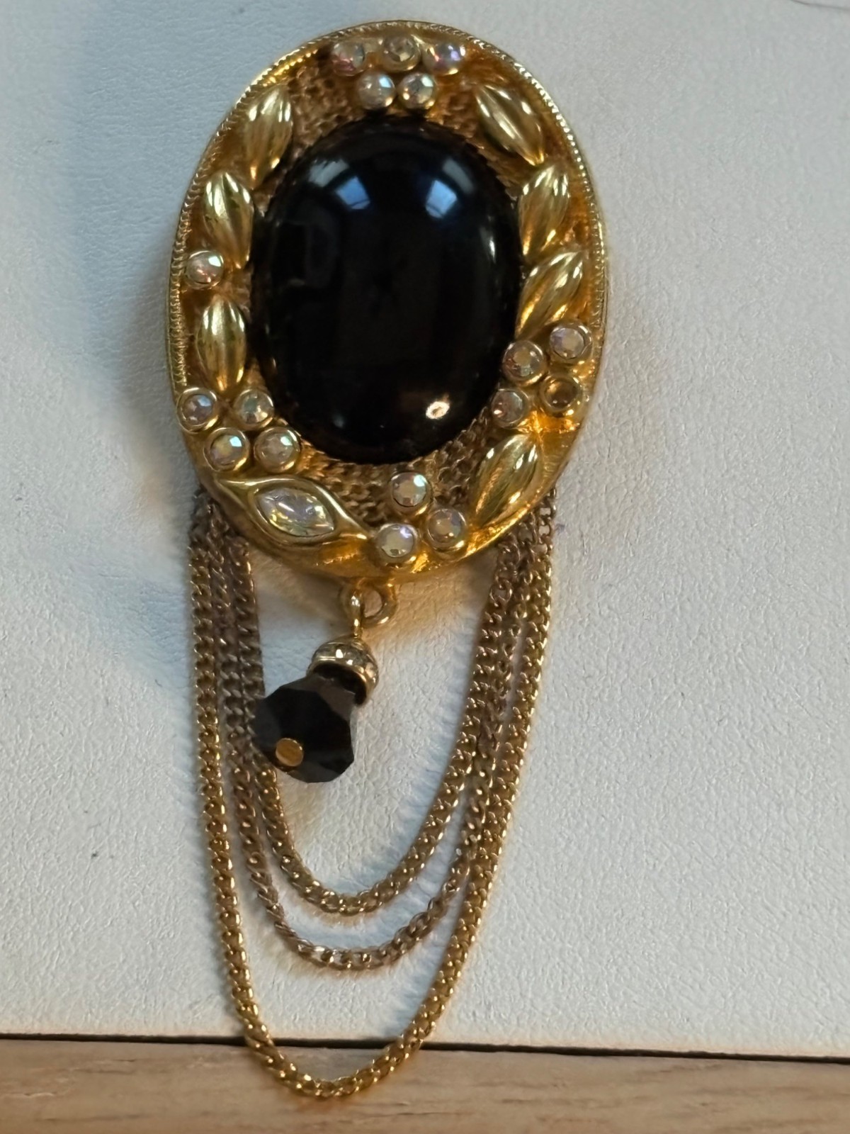 KJL signed Gold Tone Brooch With Black Stone & Crystal Accents
