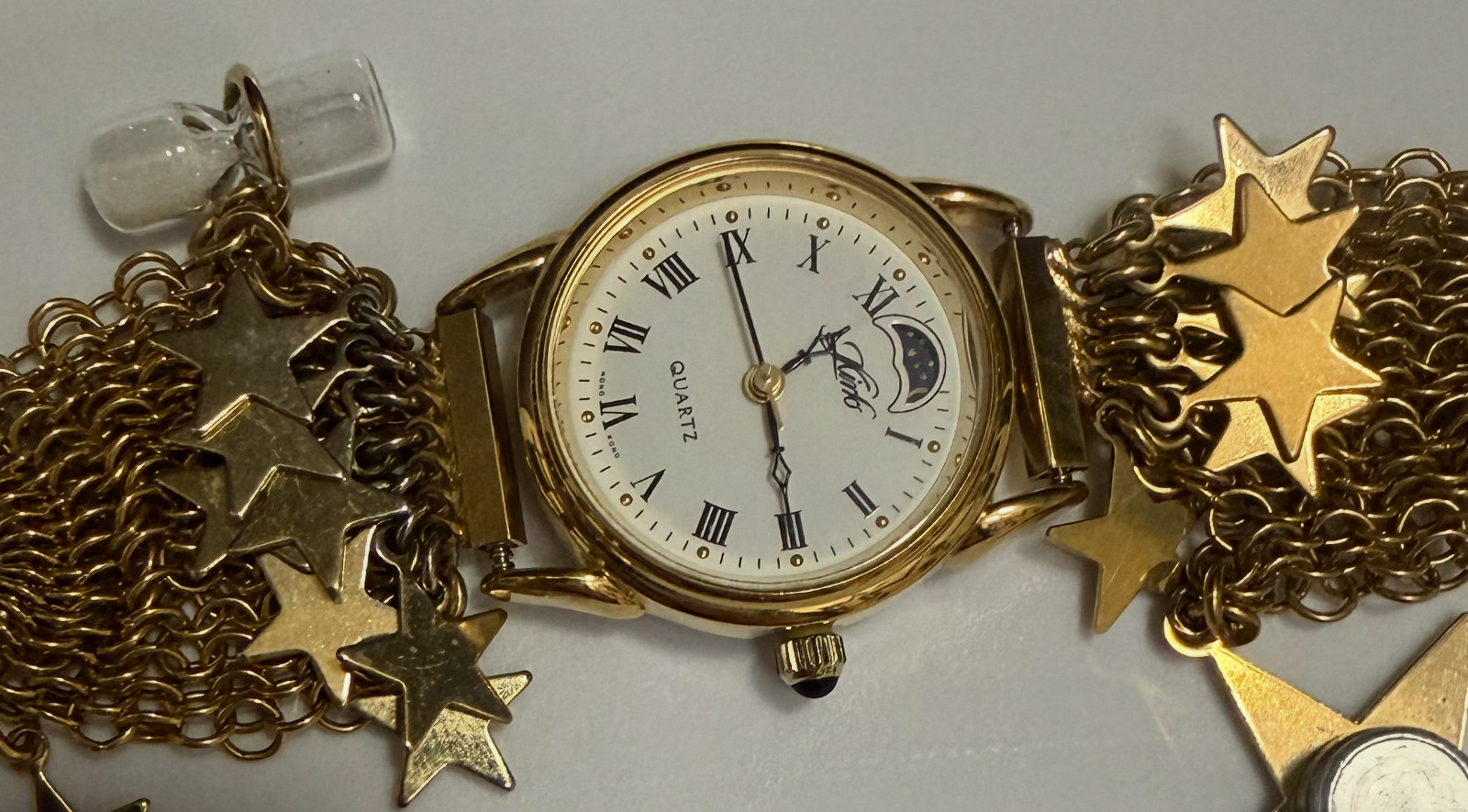 VINTAGE KIRK’S FOLLY CELESTIAL MOON STARS CHARM BRACELET WATCH COMPASS HOURGLASS