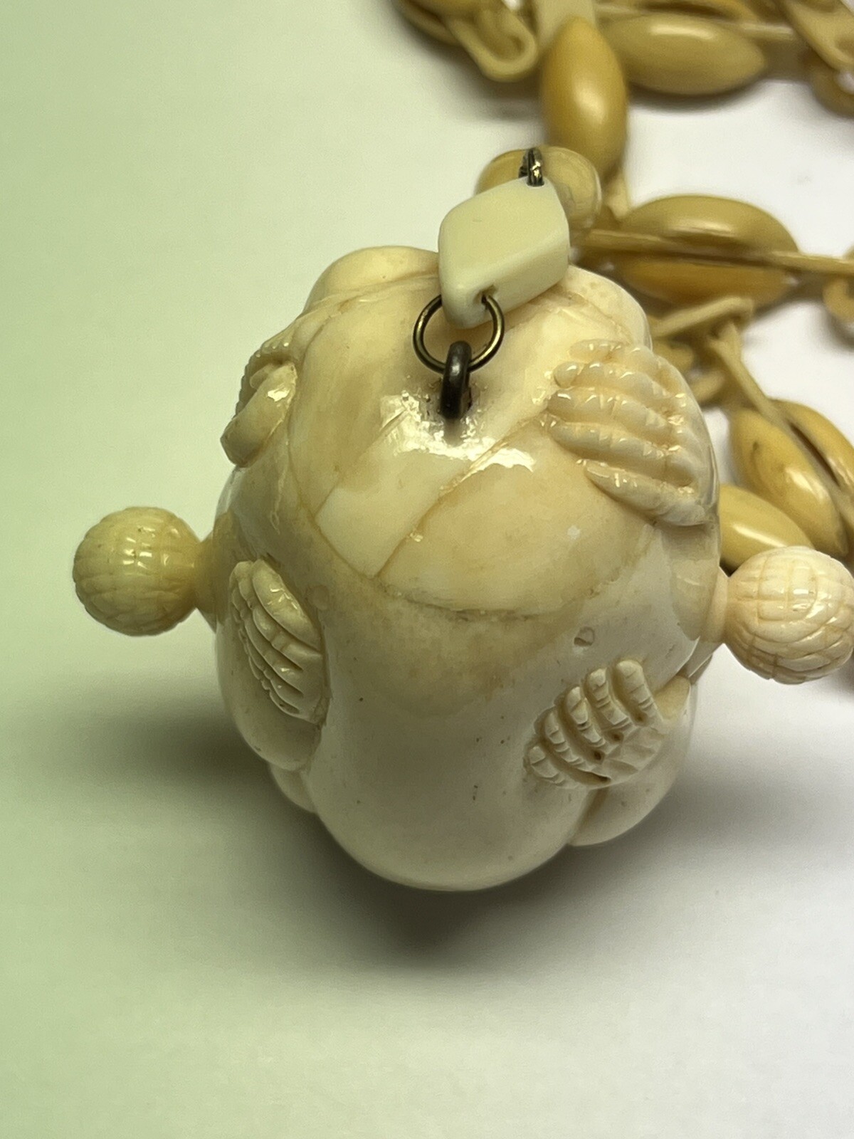 ANTIQUE ART DECO MONKEY NECKLACE TAPE MEASURE CELLULOID CHAIN PENDANT WHIMSICAL