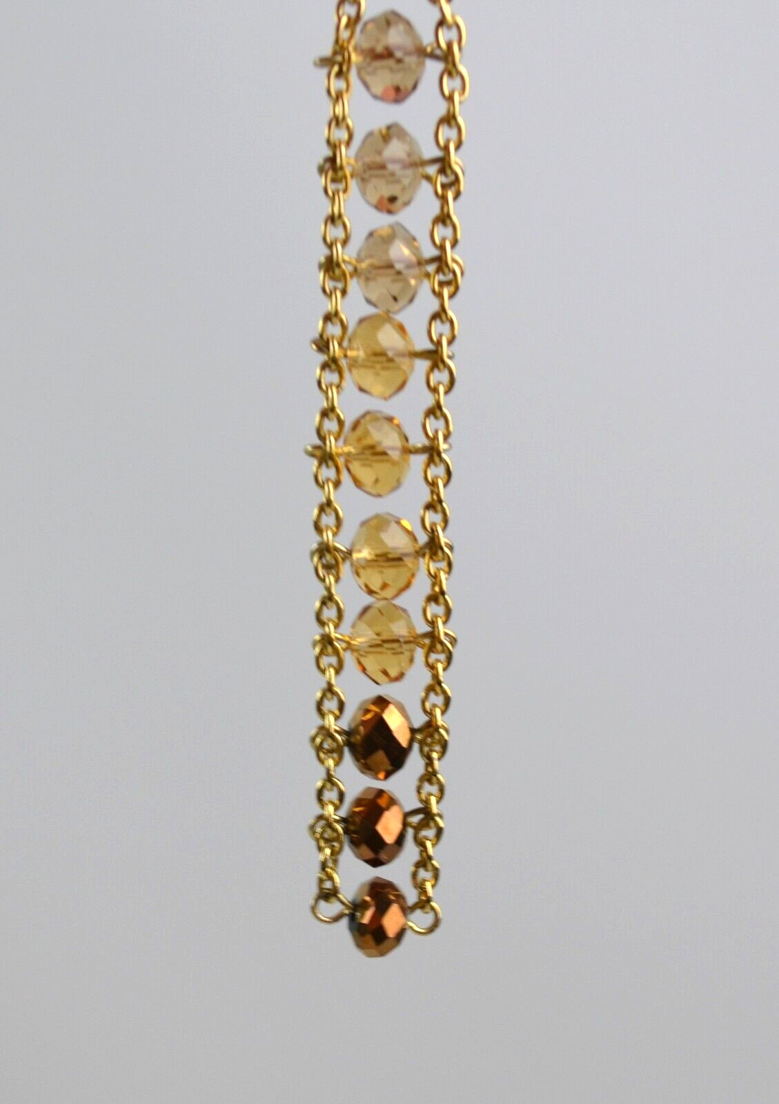 Gold Tone Dangle Pierced Hook Earrings Row of Gold Color Faceted Beads 4.5″