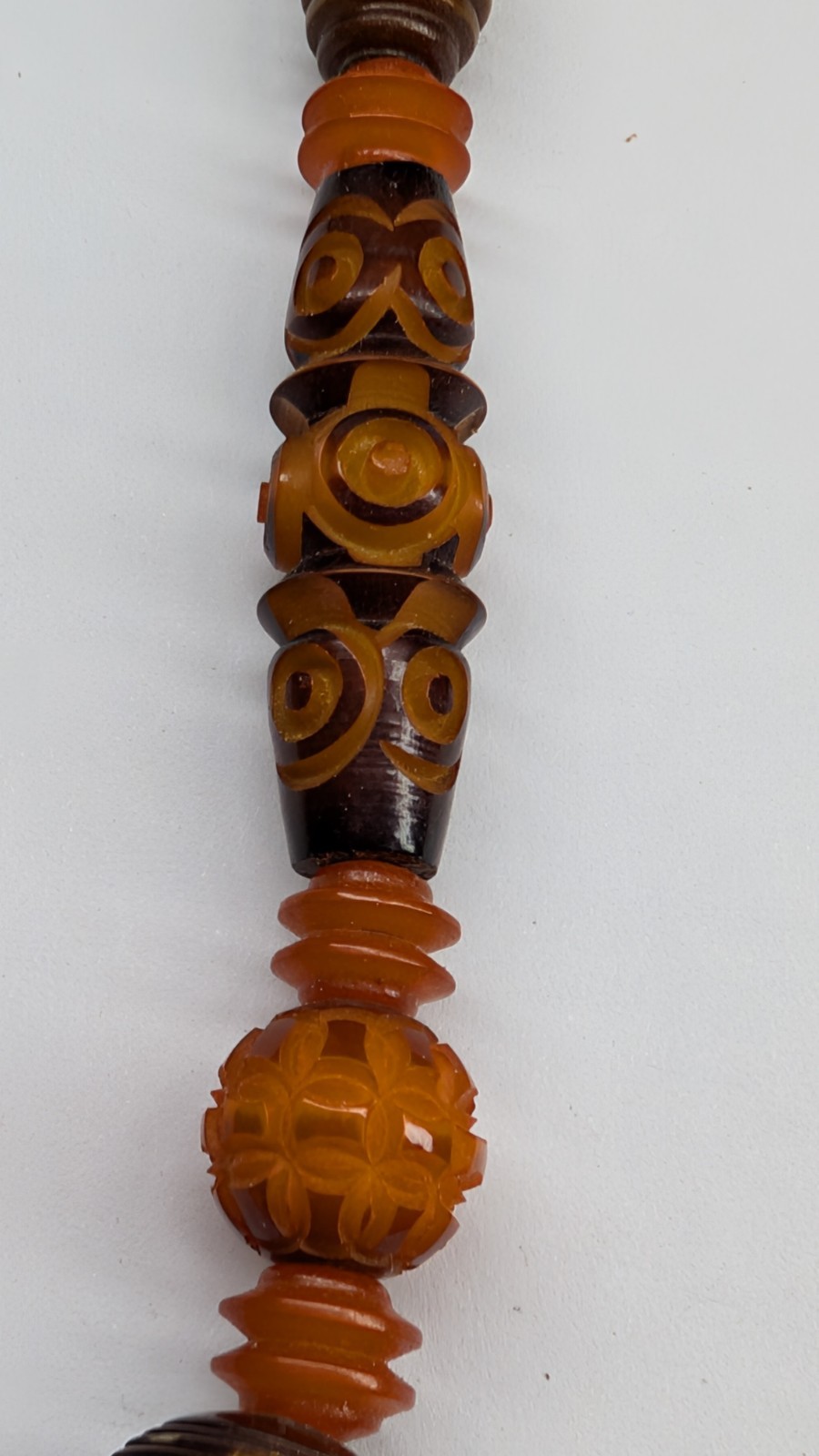 Antique Art Deco intricately carved celluloid bead necklace in Fall colors