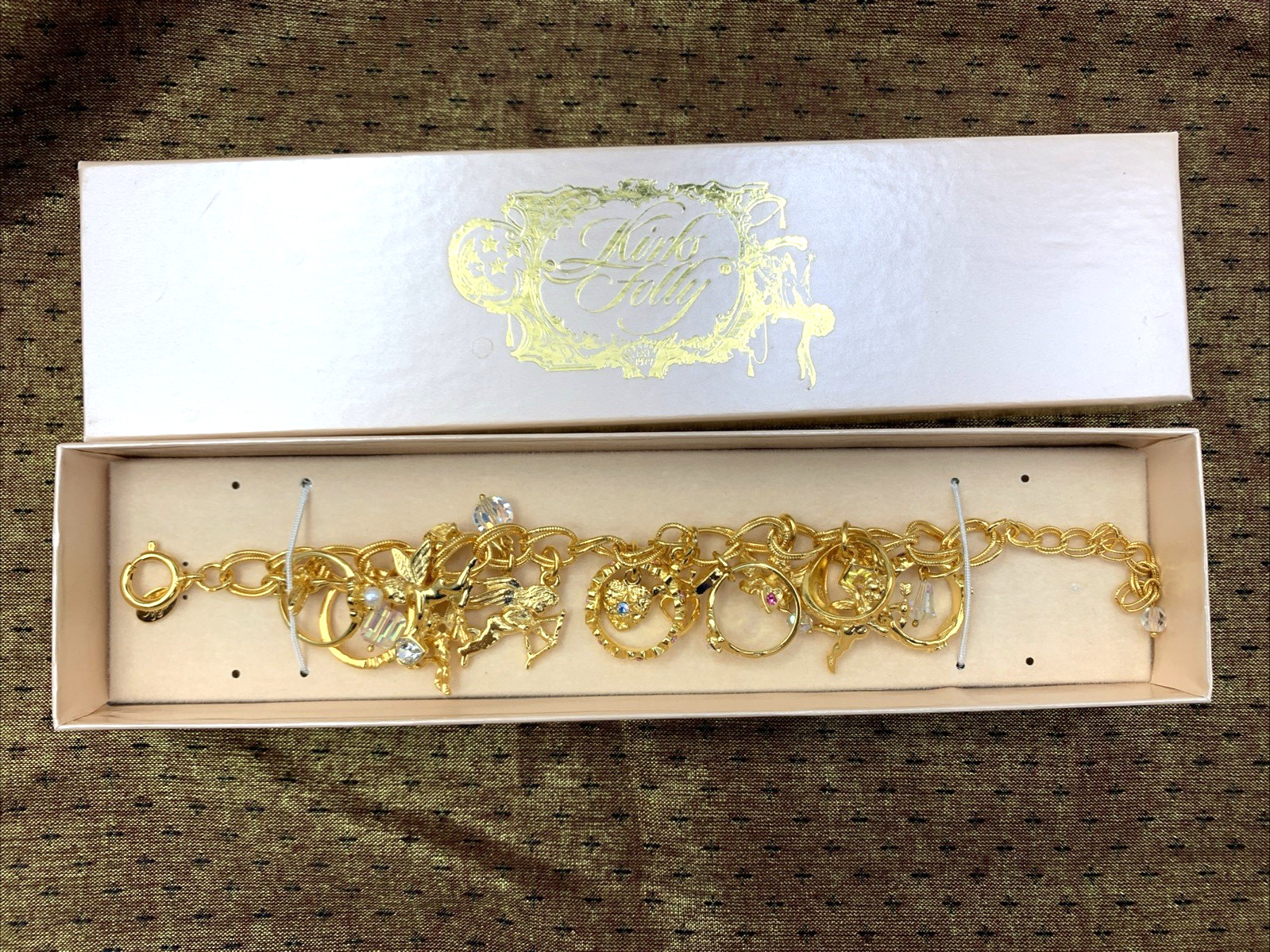 Kirks Folly Gold Tone Charm Bracelet Cupid Hearts Rings Crystals Angel