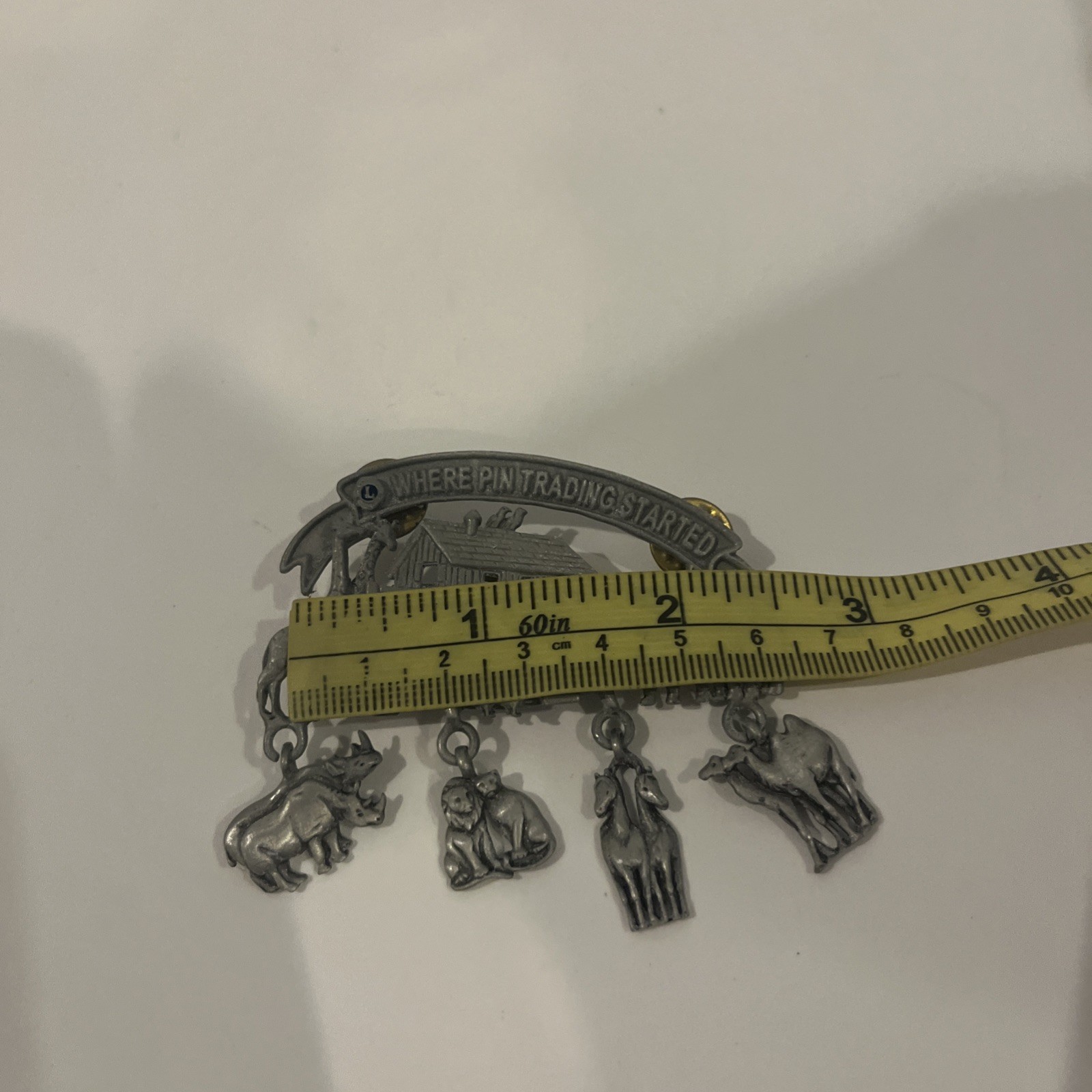 JJ pewter Noah’s Arc pin (brooch) measures approximately 2 3/4”wide