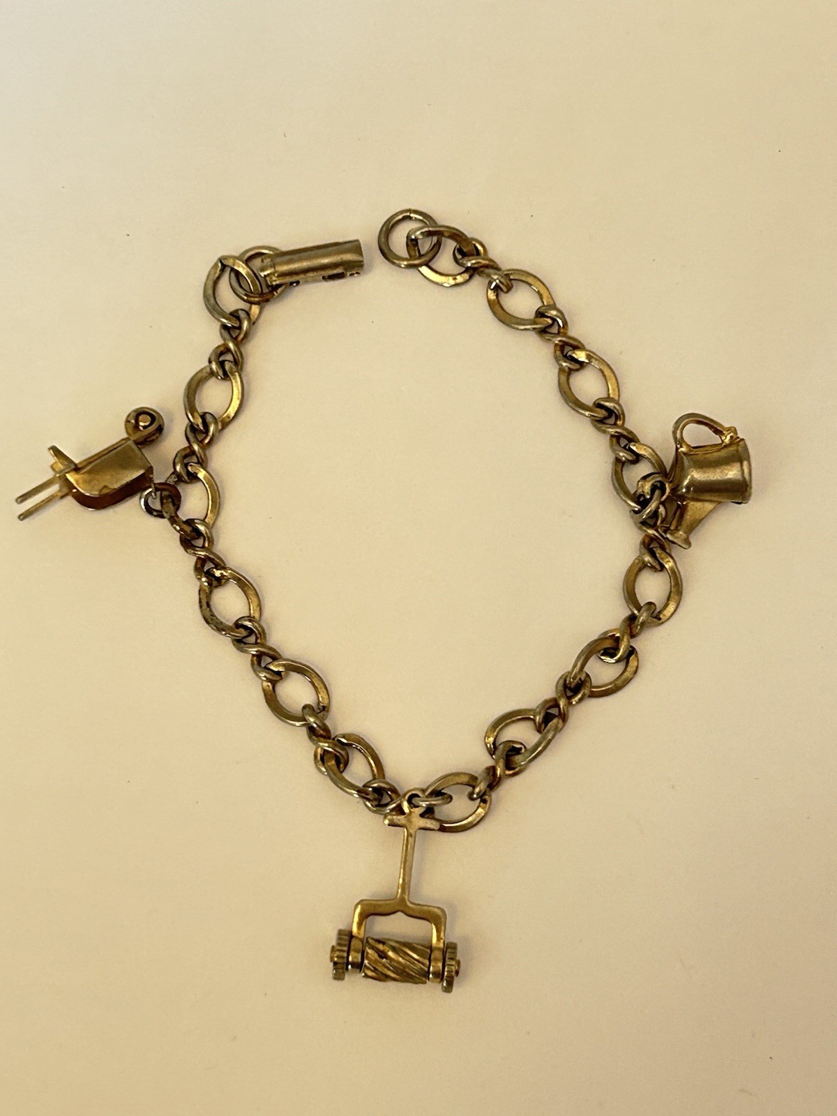 Vintage Silver Tone Bracelet With Hammer Wheelbarrow And Teapot Charms B17