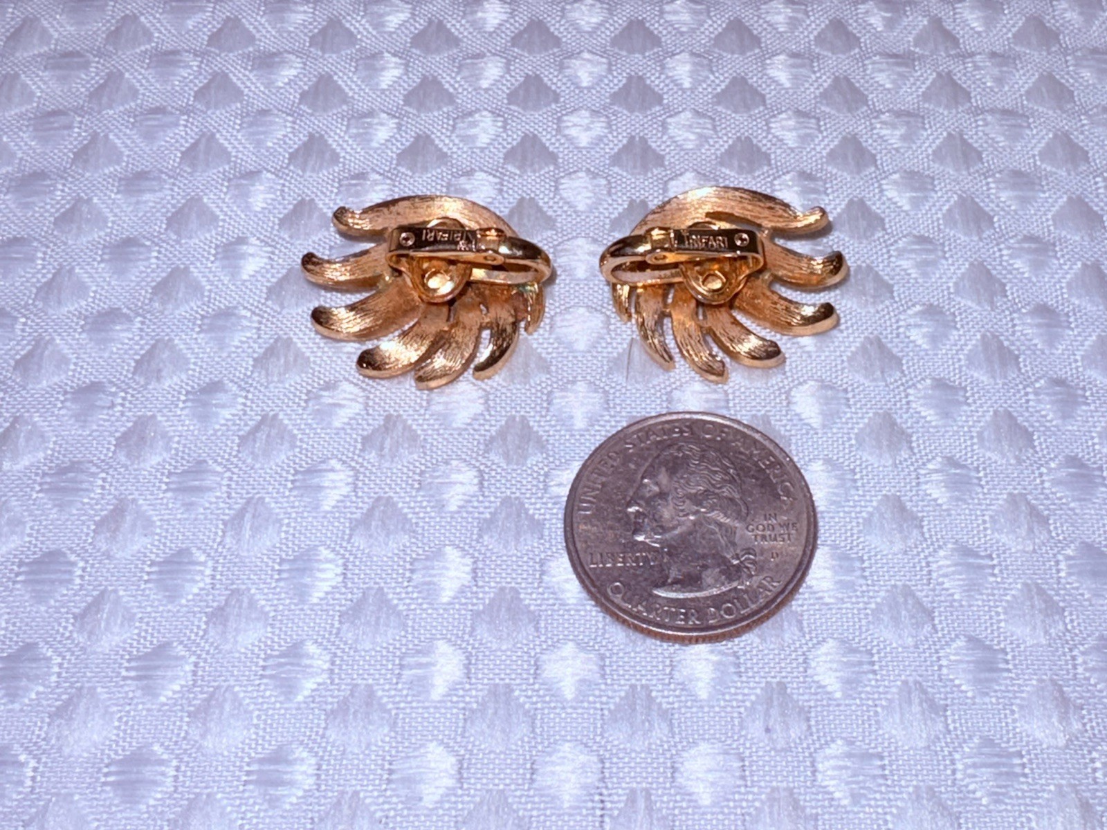 Vintage Crown Trifari brushed gold tone finish leaf clip-on earrings