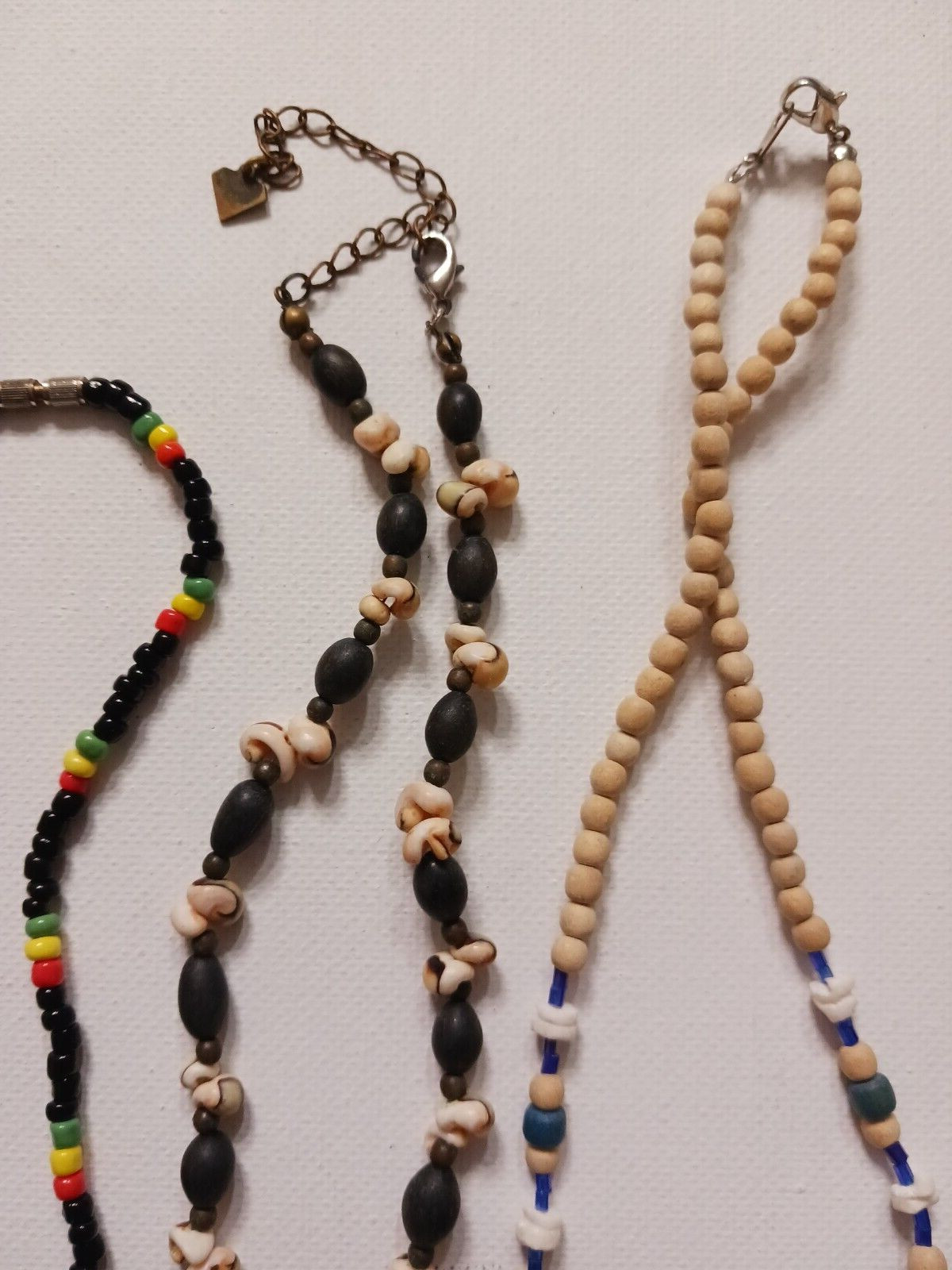 Metal beads and other shell + stone odd beads. Vintage necklaces. Lot of 8