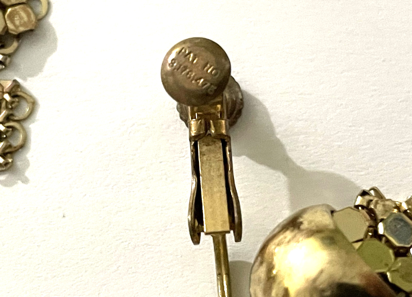 Vintage MIRIAM HASKELL Signed Gold tone Adjustable Clip-on Dangle Earrings.
