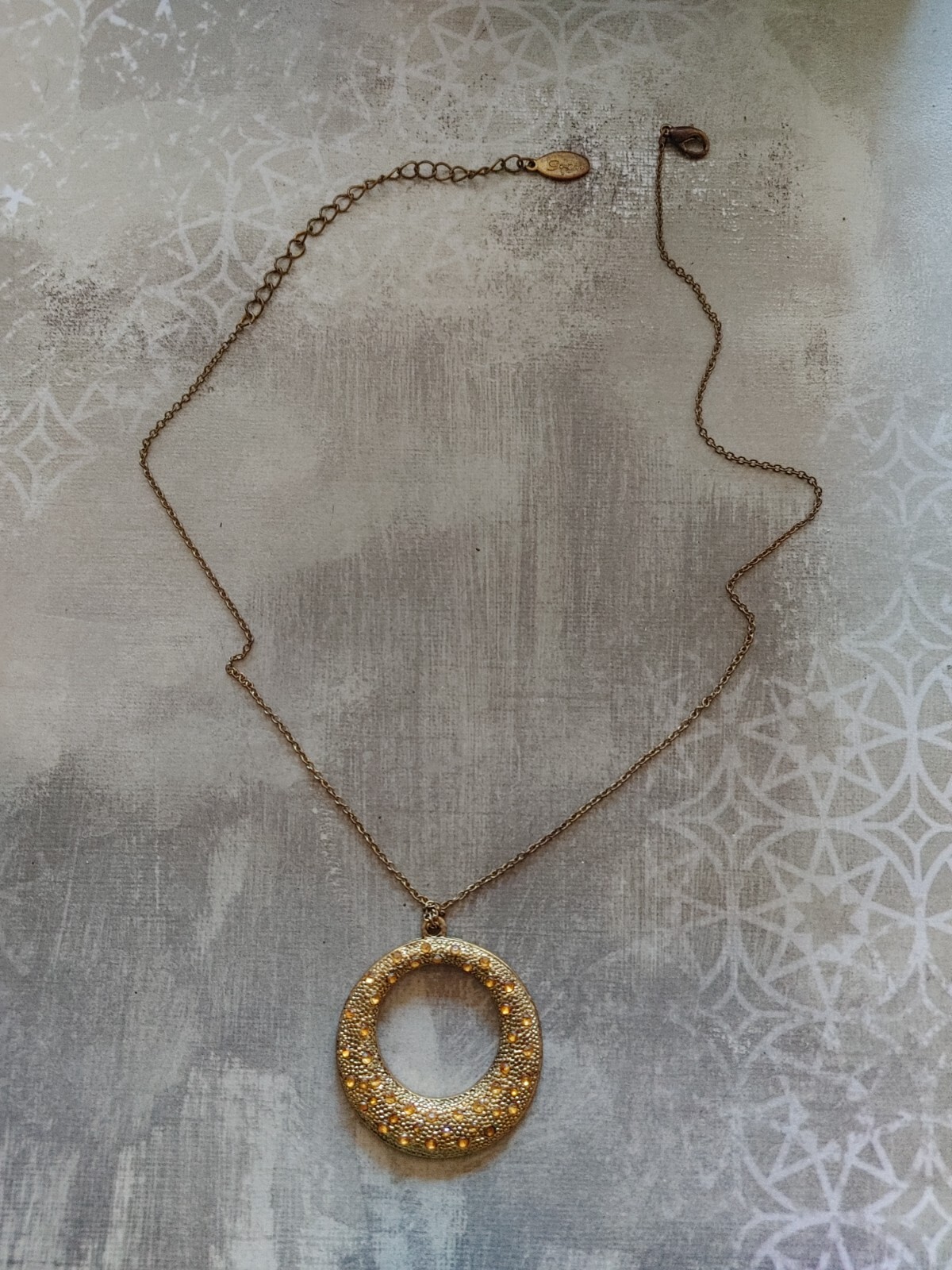 Vintage necklace gold tone metal circle yellow rhinestone signed Gwen