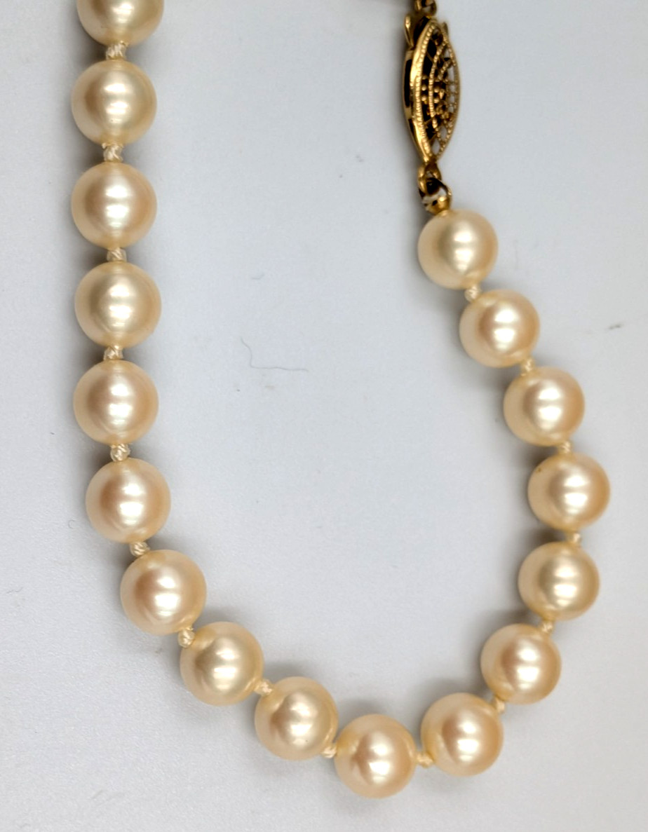 28 inch faux pearl necklace knotted with fish hook clasp unmarked vintage
