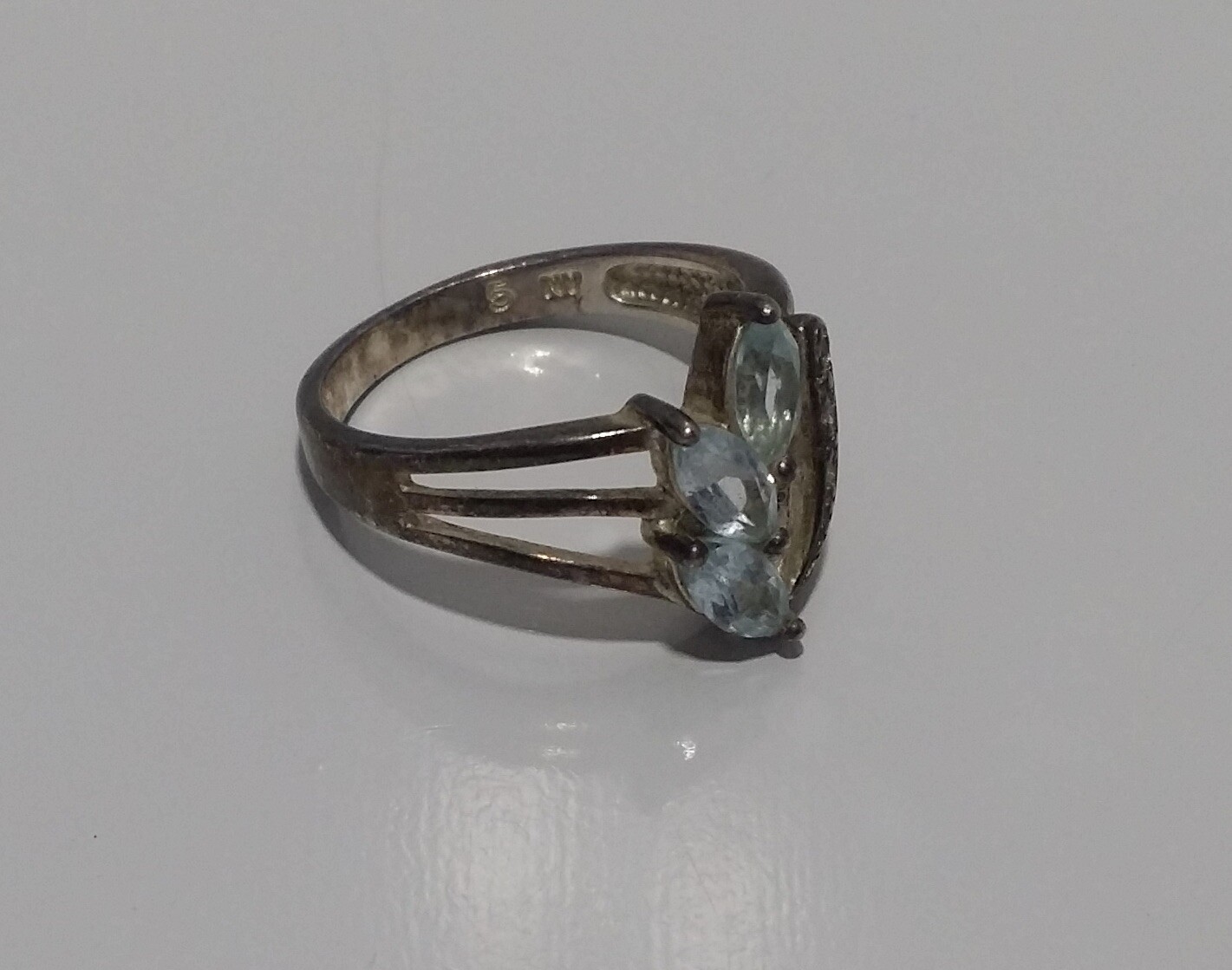 925 NV Sterling Silver Light Blue Topaz & Clear CZ Ring – Size 5