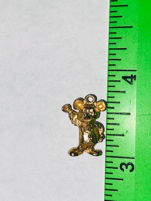 Vintage mid-century 14k yellow gold Disney charm/pendant features Micky Mouse
