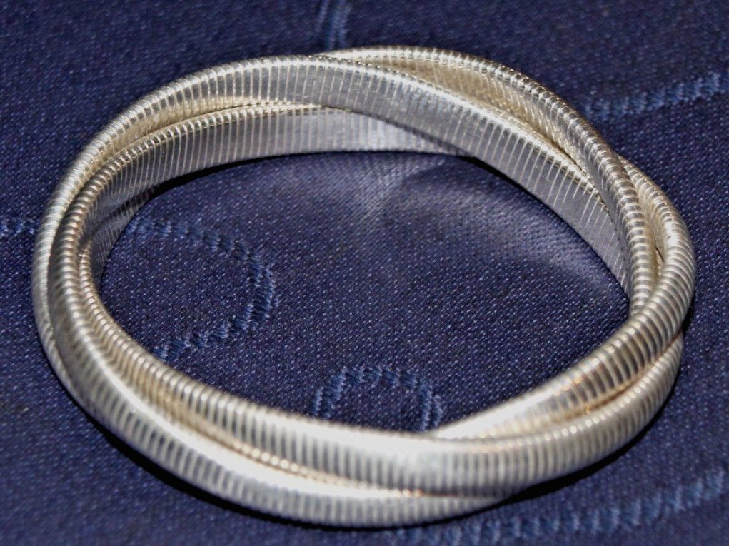 LEONORE DOSKOW STERLING SILVER TRIPPLE STRETCH BRACELET