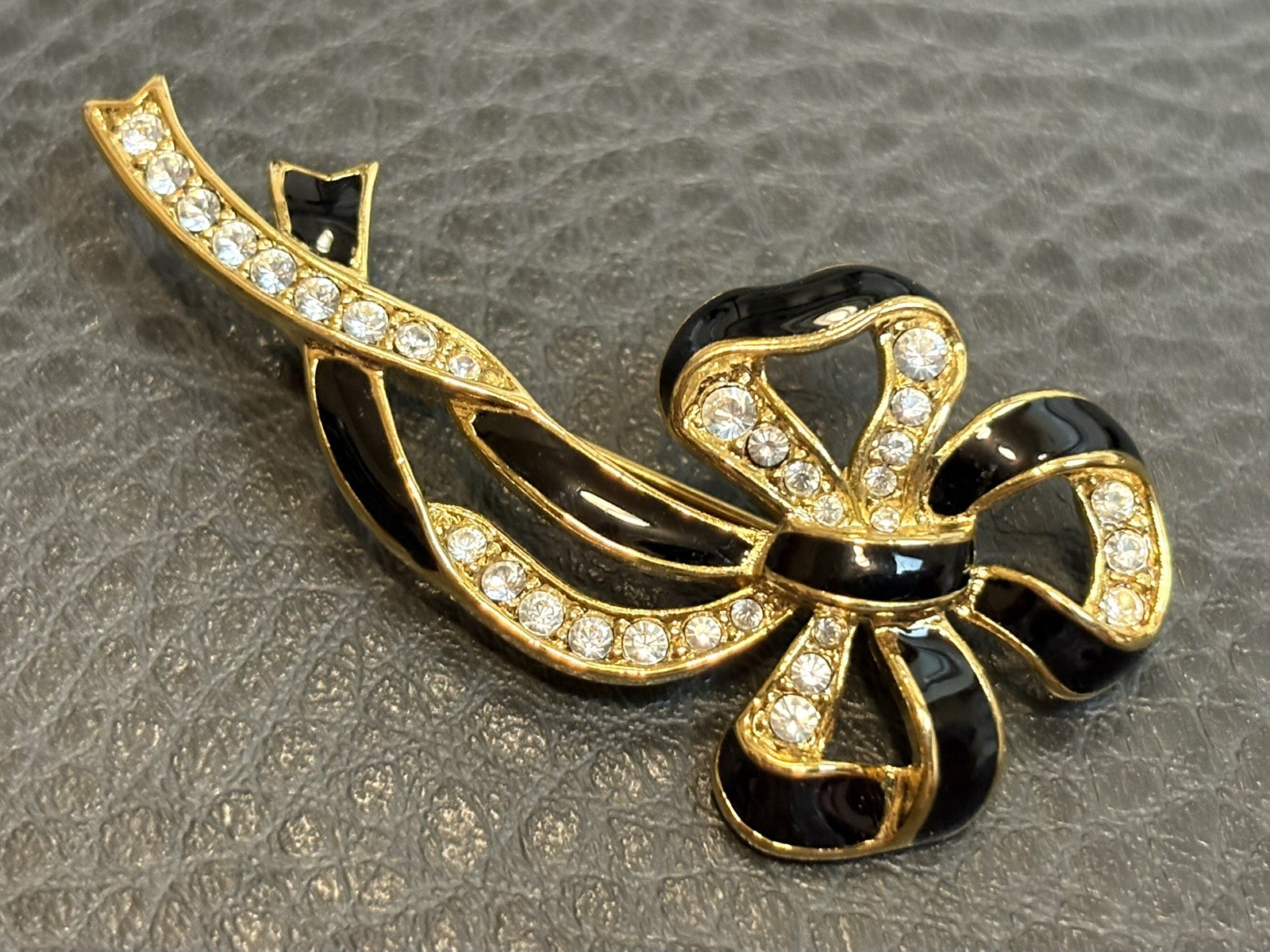 Vintage 80s Runway Gold Tone Rhinestone Black Enamel Ribbon Bow Brooch Pin