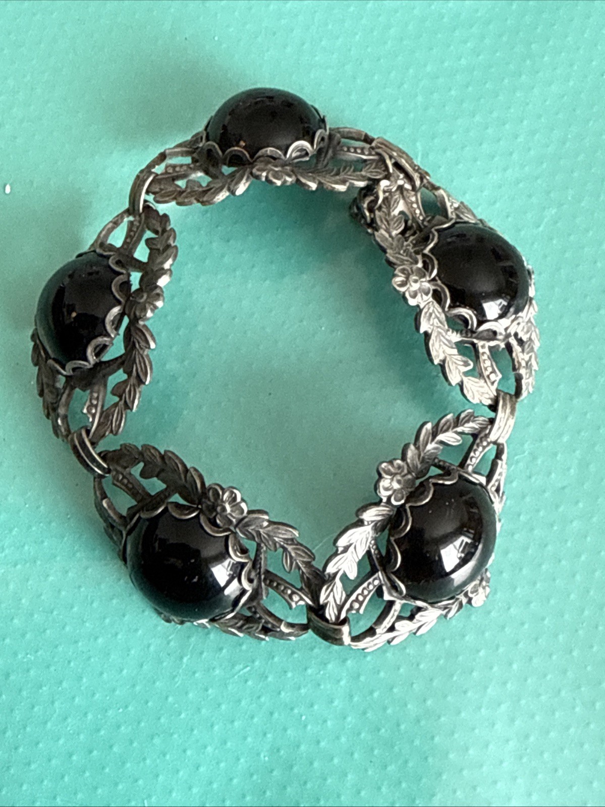 Silver Tone floral vintage panel bracelet with black stones 7”
