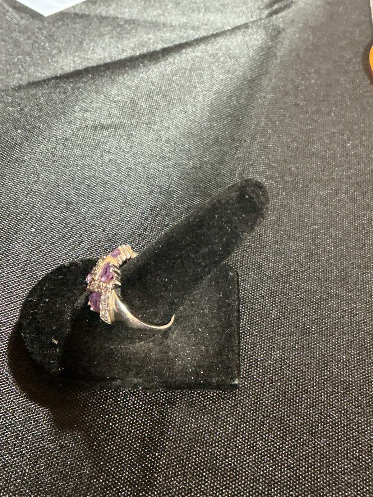 sterling silver ring features amethyst trillion-cut gemstones