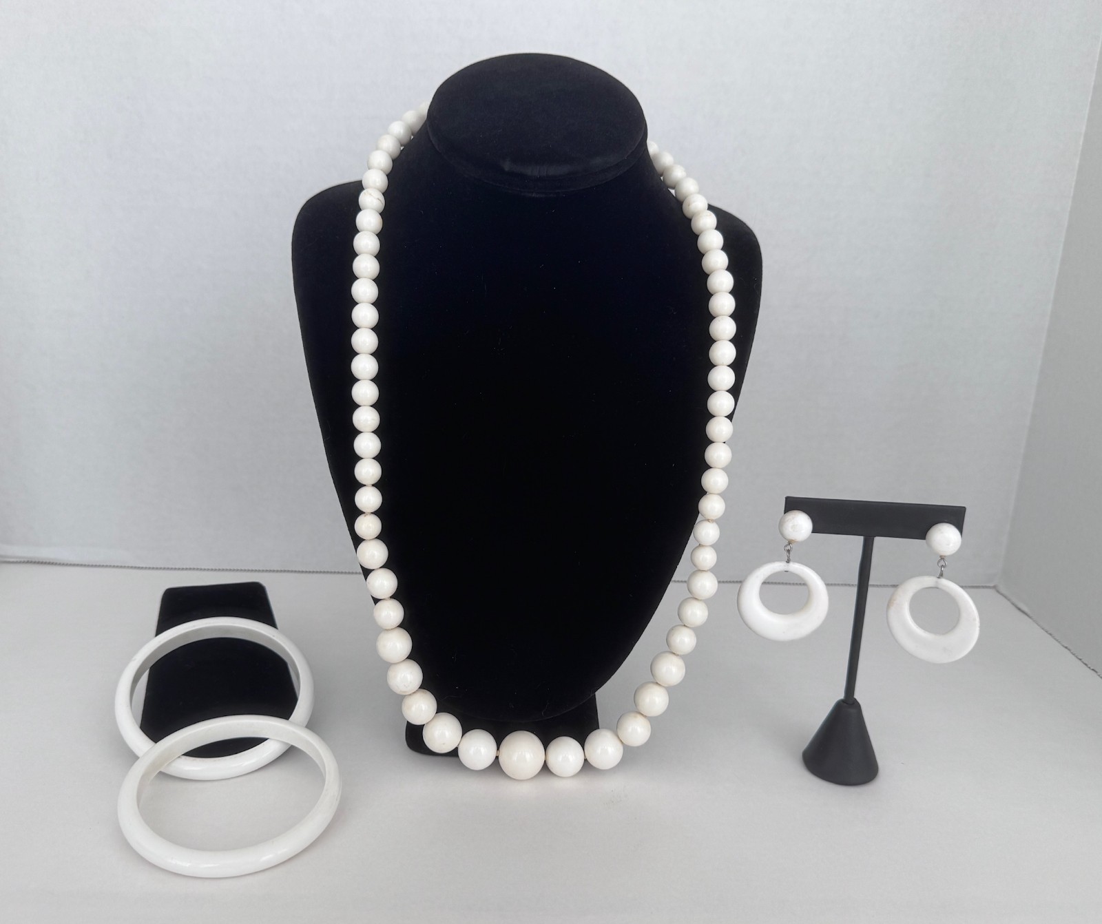 MCM White Plastic Jewelry Set – Necklace, 2 Bangles, Clip-on Earrings