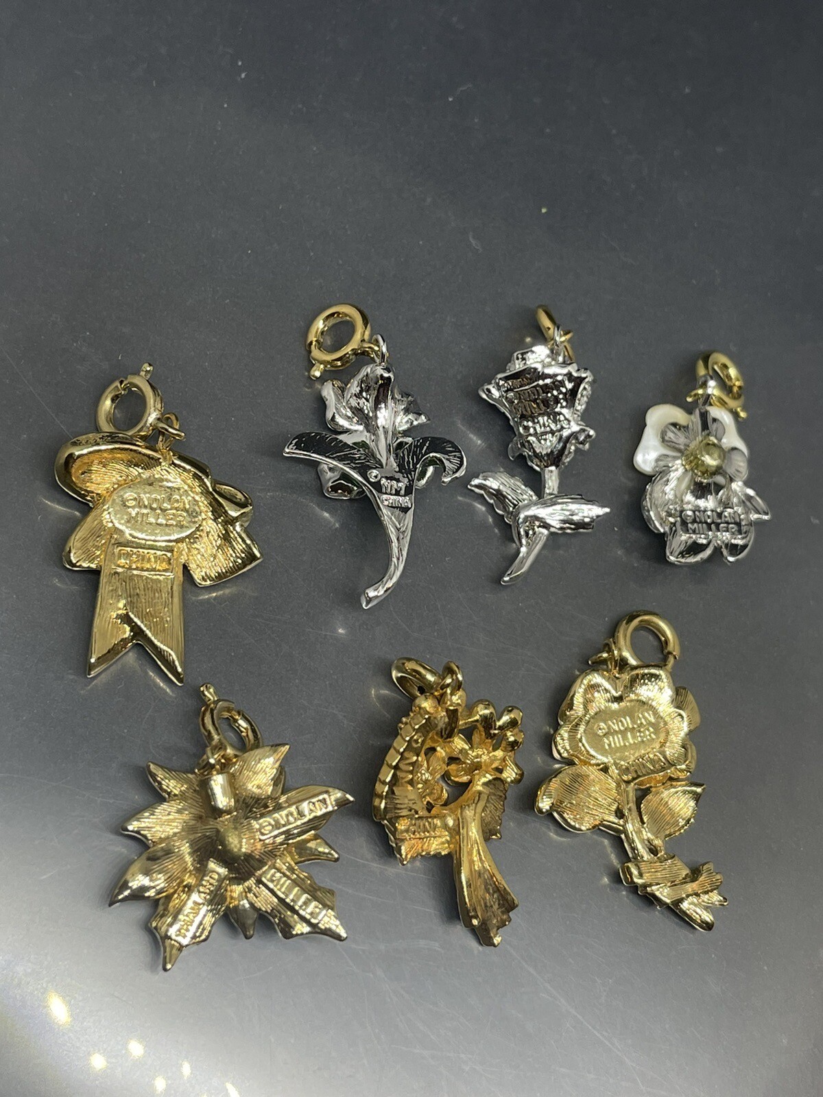VTG Signed Nolan Miller Glamour Collection Set Of 7 Flowers Bow In Pouch Charms