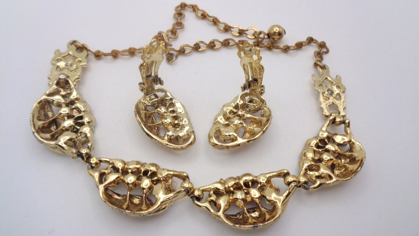 Vintage Textured Gold Tone Leaf Red AB Rhinestone Necklace & Clip Earring Set
